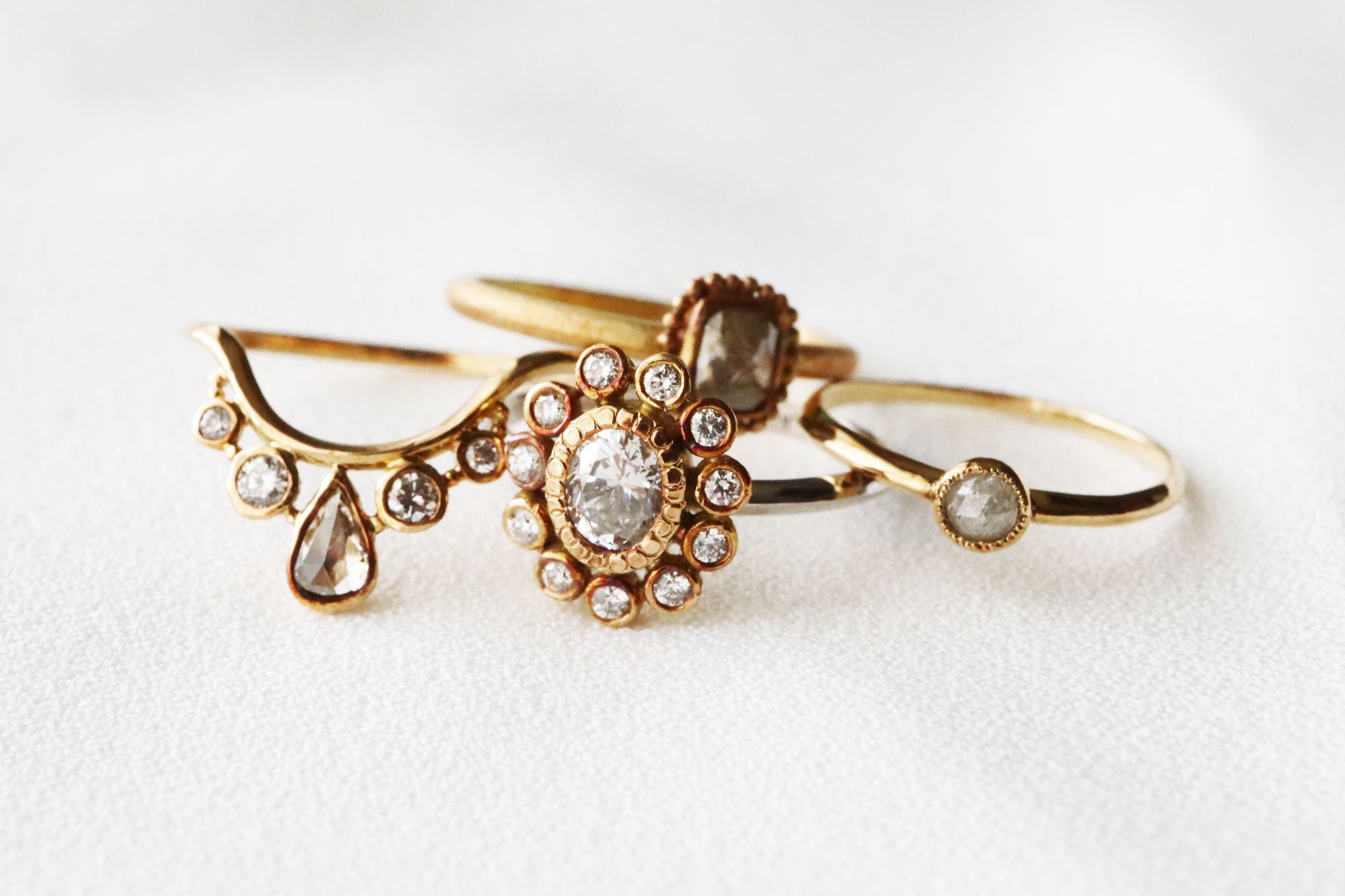 wave ring ダイヤモンド￥220000　sun ring ダイヤモンド￥33000　rosary ring ダイヤモンド￥165000　amulet ringダイヤモンド￥82500(全てK18)