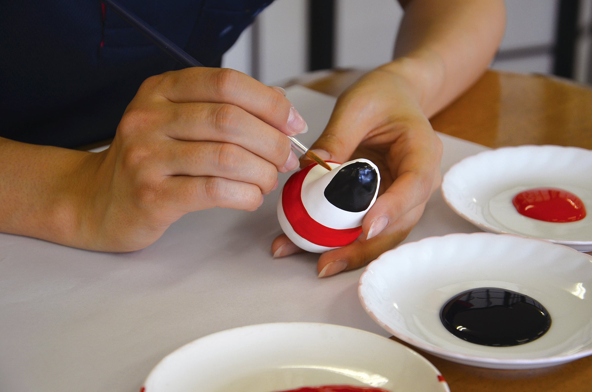 「起き上がり小法師」の絵付け体験イメージ