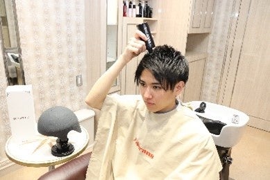 「育毛剤塗布後に SPANIST CAPを使用」