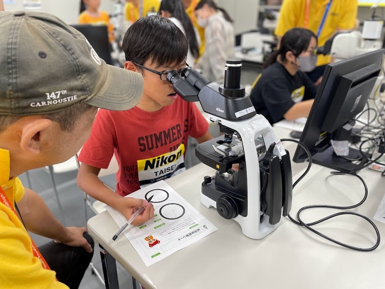 顕微鏡とプロカメラマンの世界