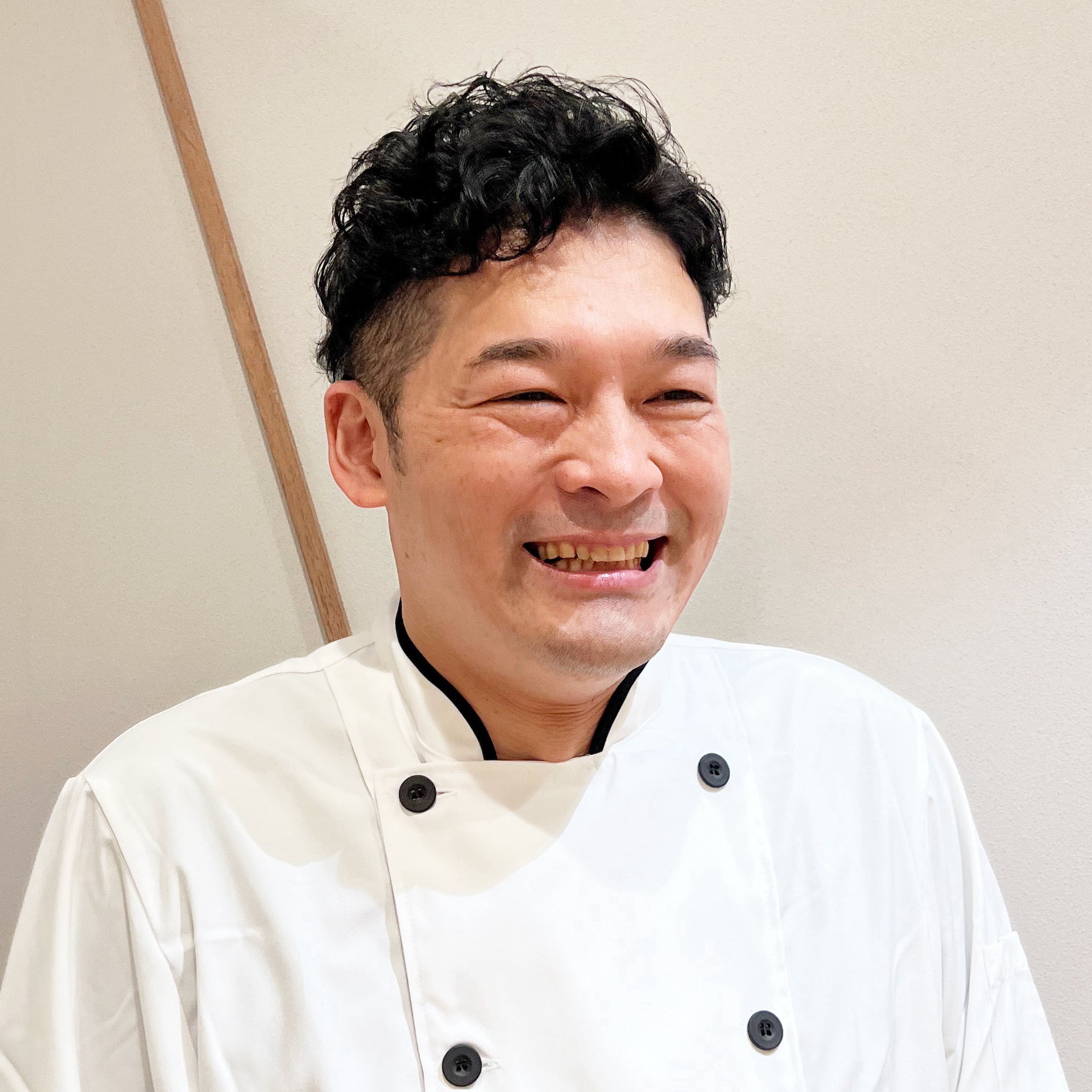 商品部部長 櫻井