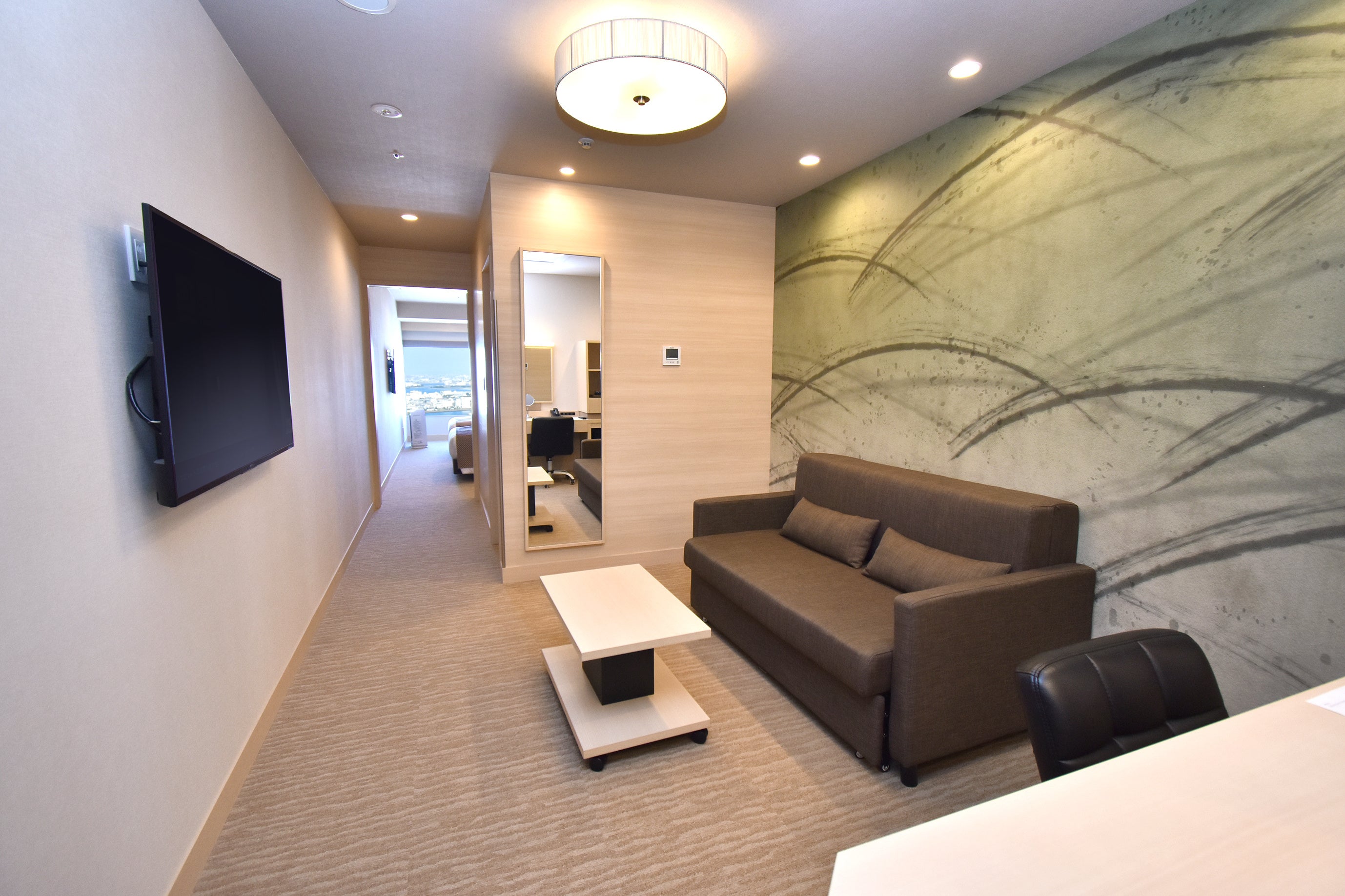 30㎡超のゆったりとしたゲストルームは、リビングとベッドルームが分かれたスイートタイプ