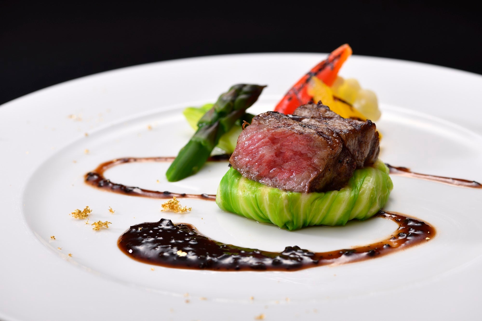 県産和牛サーロインのグリエとアグー豚の煮込み　トリュフソース