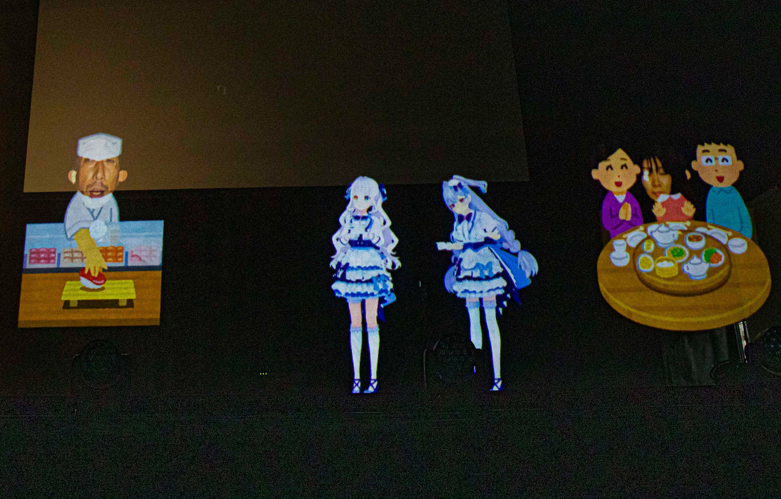 上海のファン（右のイラスト）と、日本のファン（左）が、 バーチャルのステージに上がってNHOT BOTと共演。 XRライブならではのファン交流の新しい形を提示。 （2022年9月16日にTheater Mixaで実施されたプレス発表会にて）