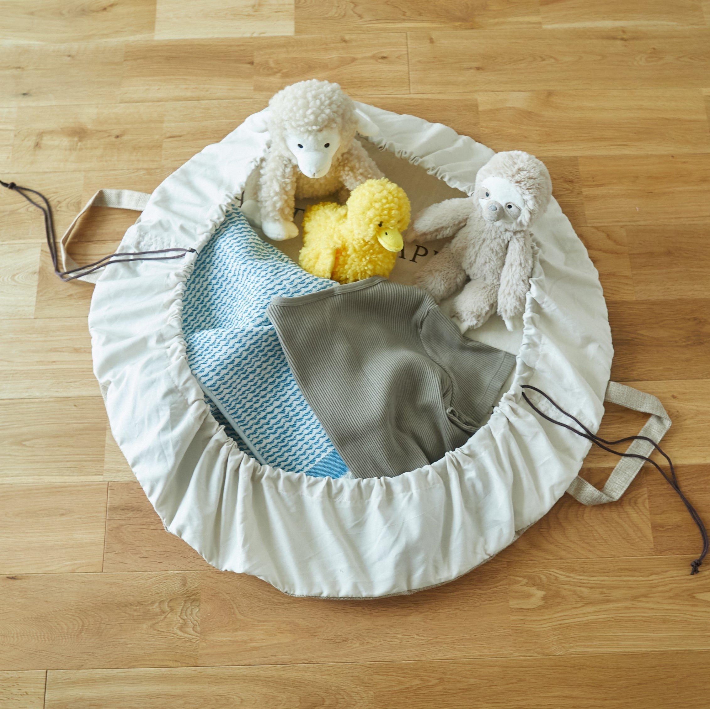 〇片づけ巾着型マット