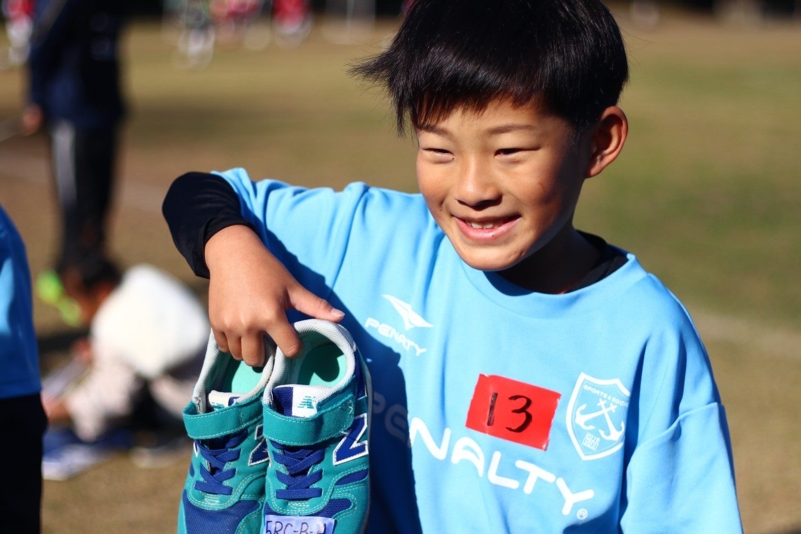 ネパールの子に届けるシューズを寄付して参加した選手