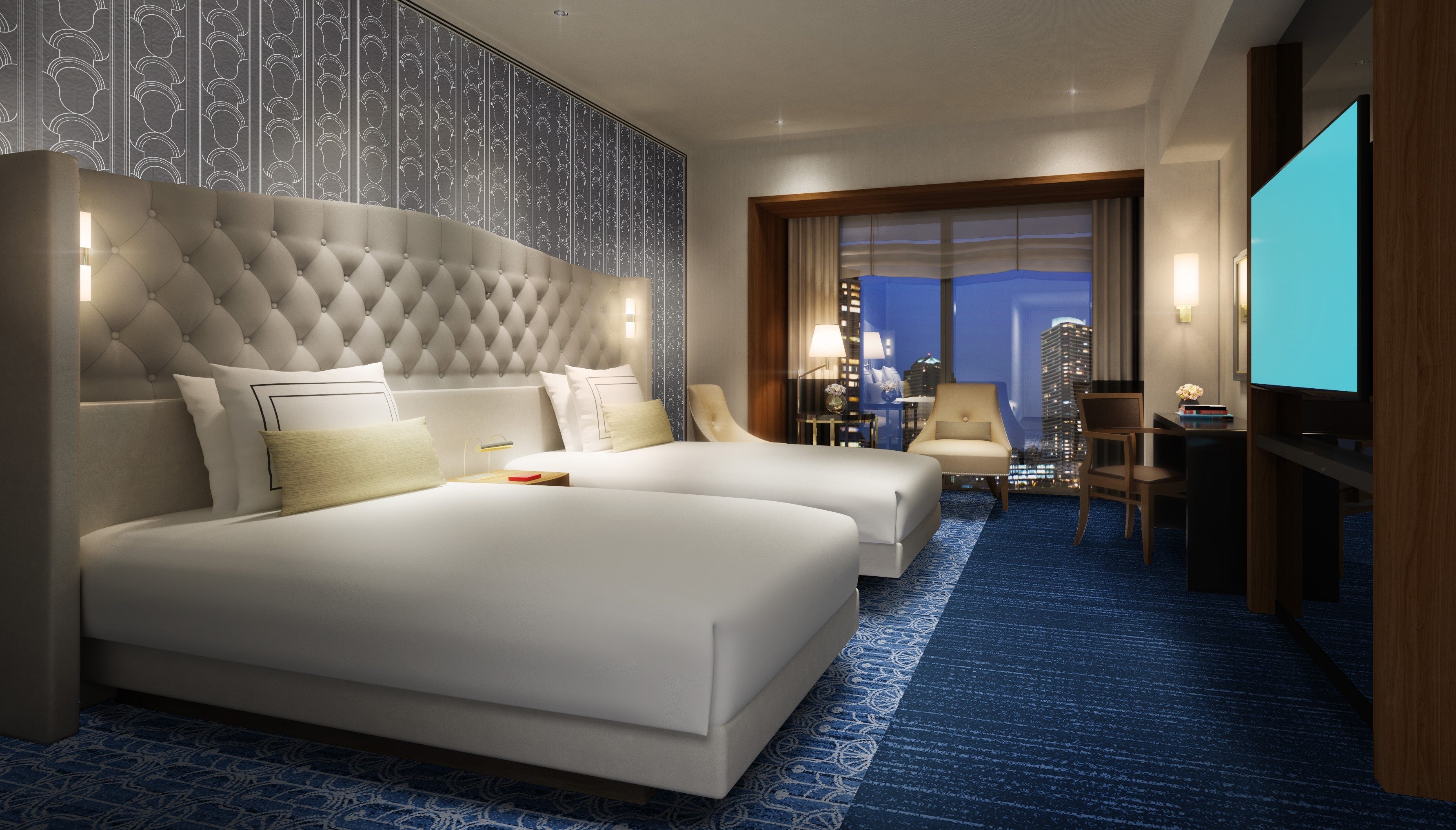 大きな窓から横浜のシティビューを眺望するゲストルーム