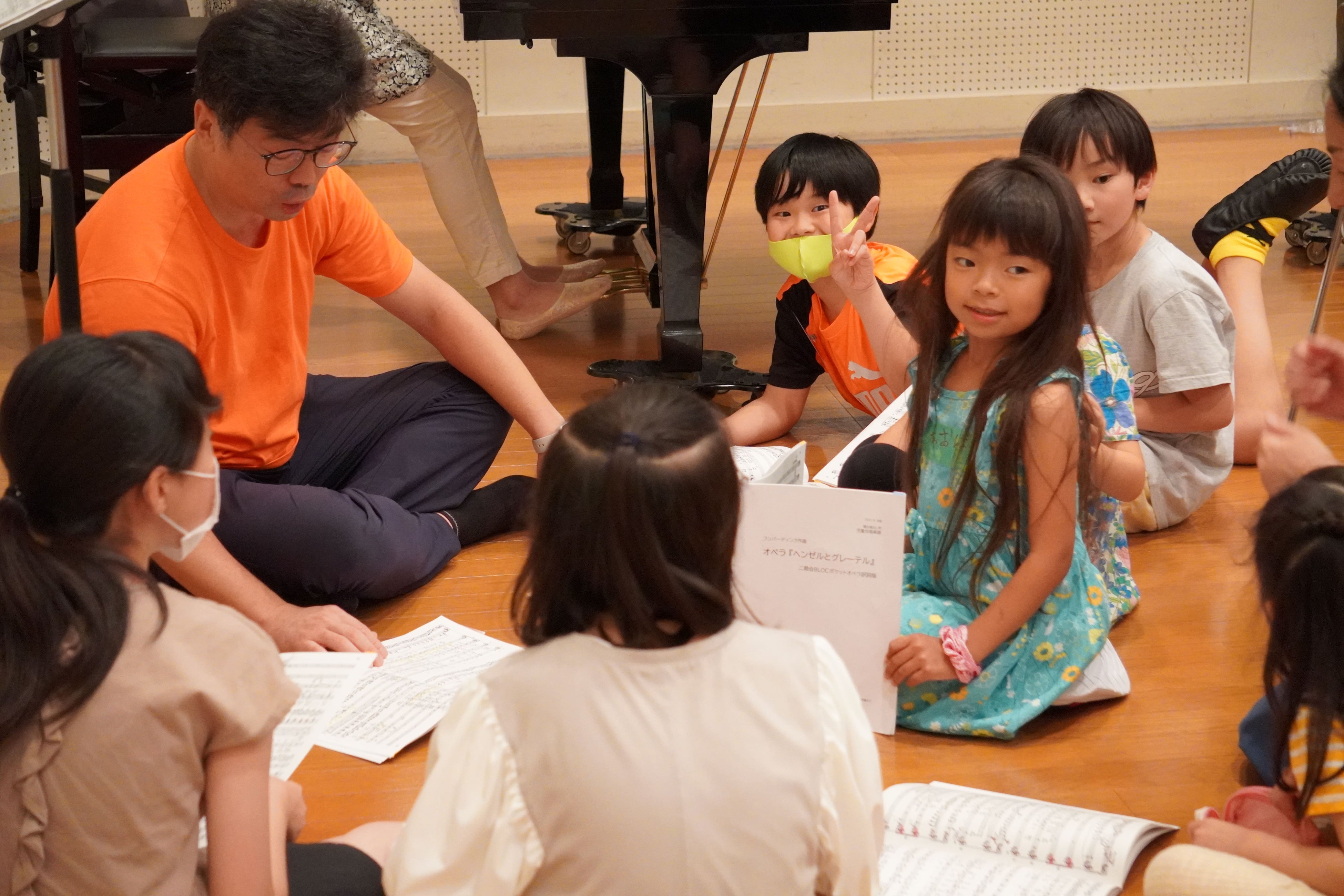 合唱指導者と作戦会議中