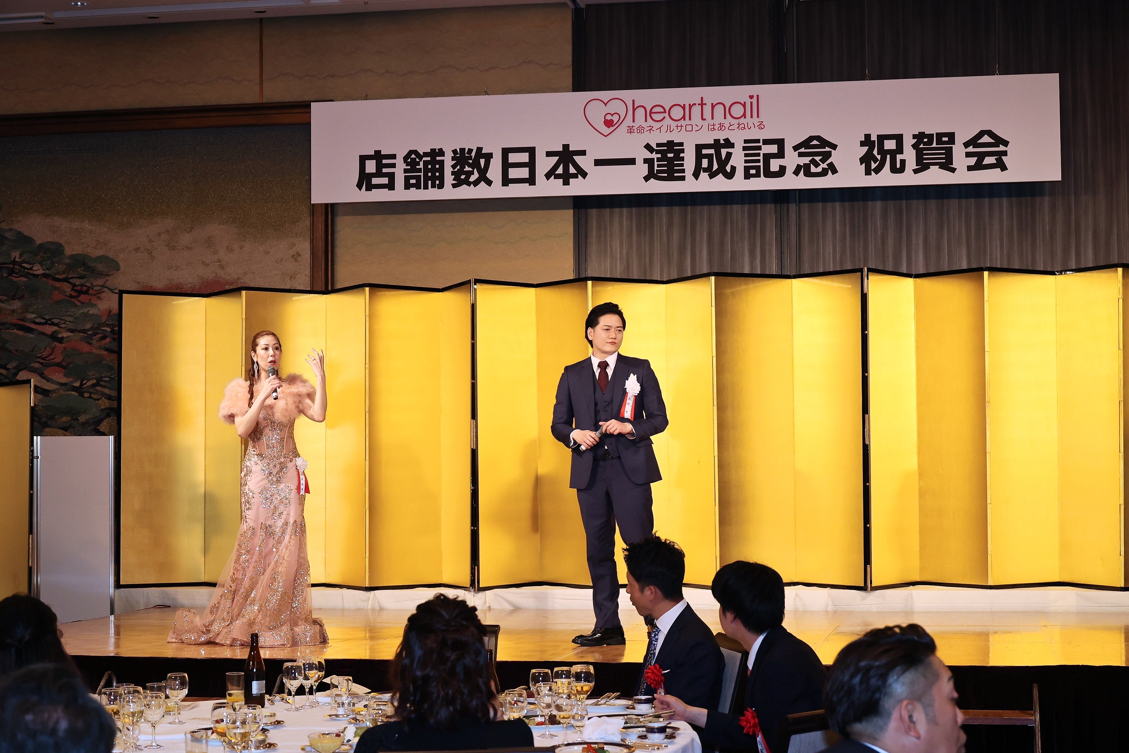 左代表取締役社長小原　右取締役副社長嶋嵜