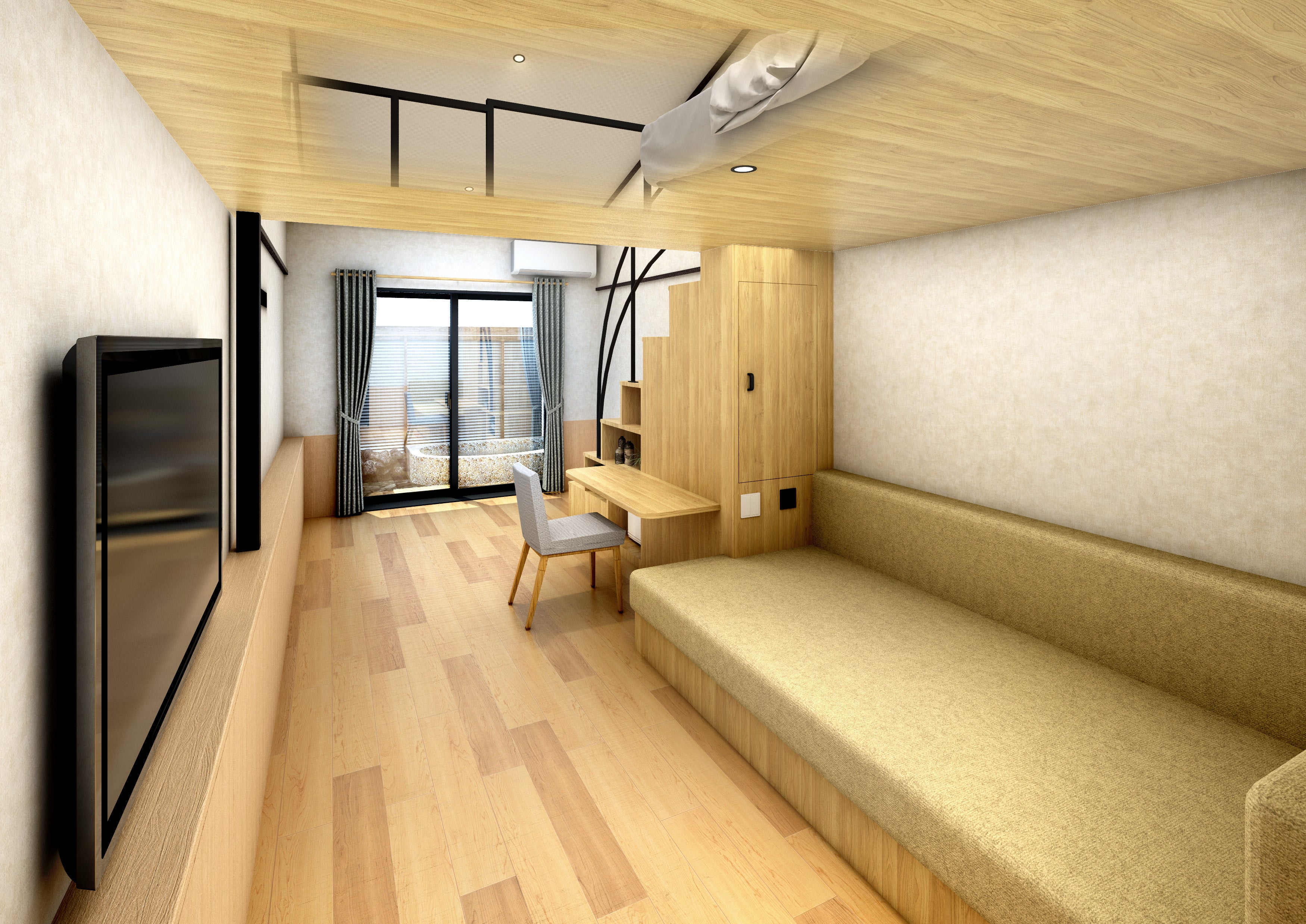 大きなソファーベットが印象的なお部屋