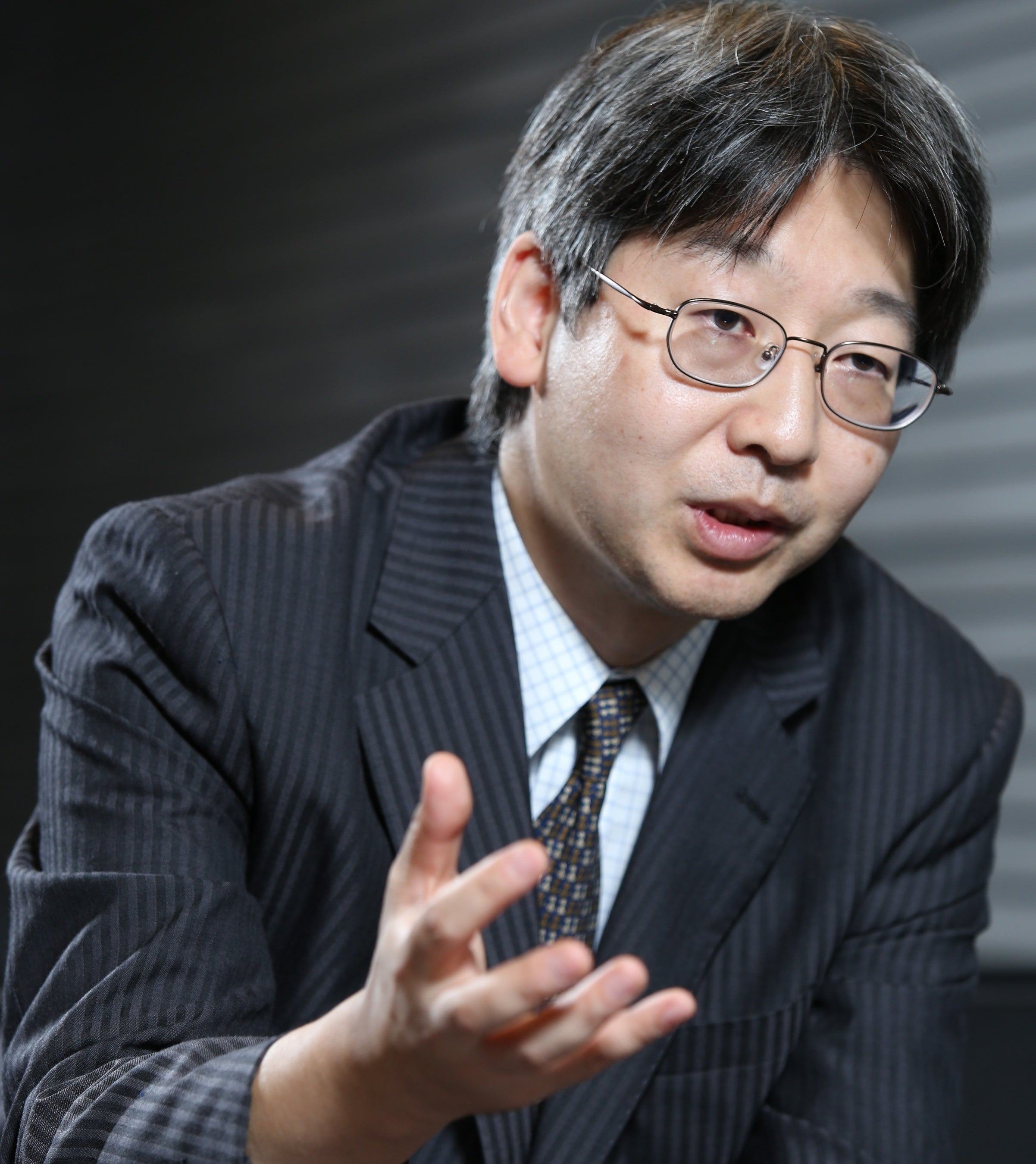 先端生命医科学研究所所長清水達也教授