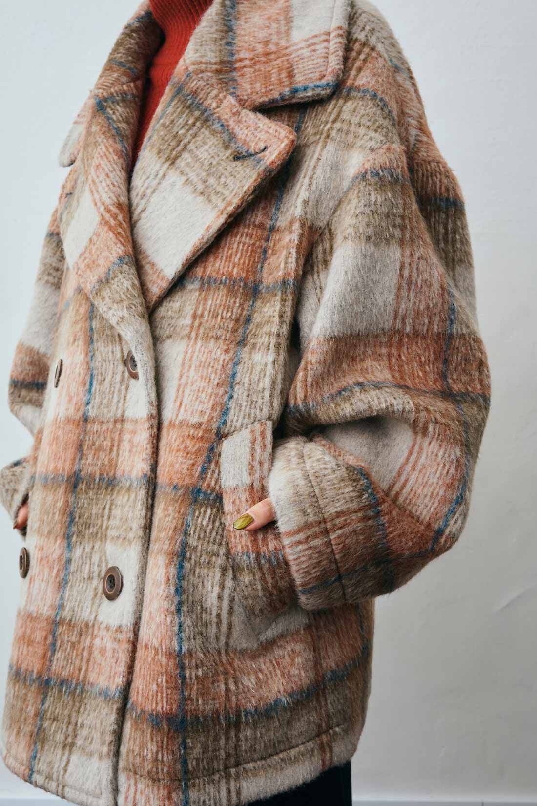 冬を彩るファッショナブルなアウター「ミックス調ウール混カルゼ