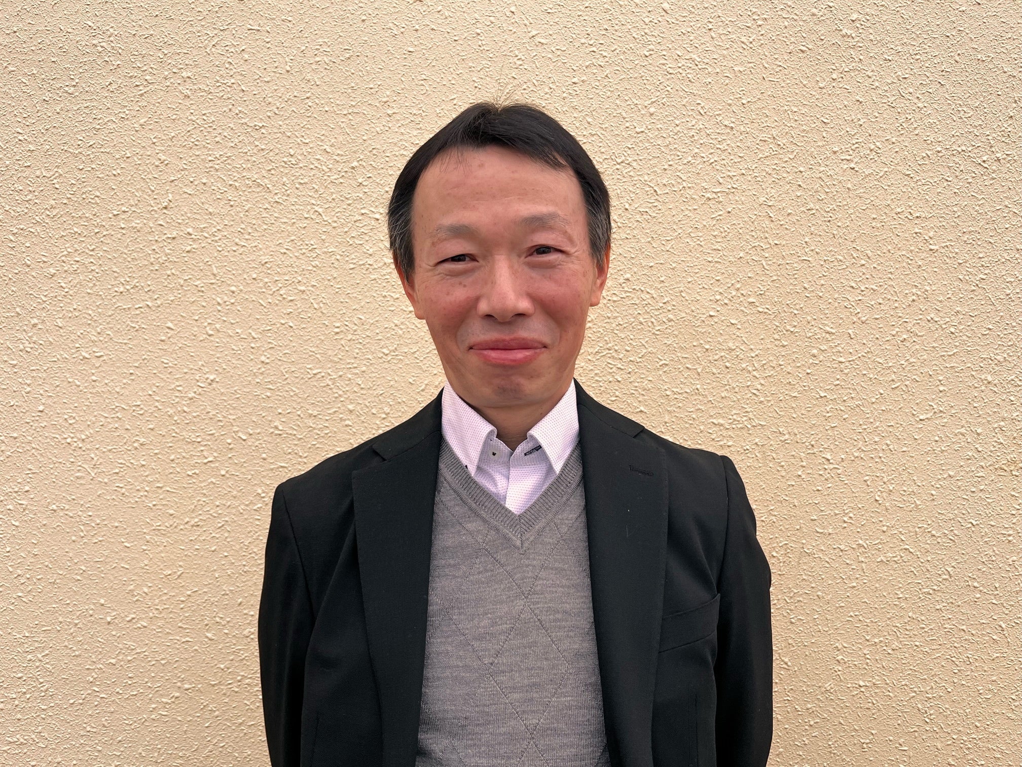 総務部長　佐藤吉久