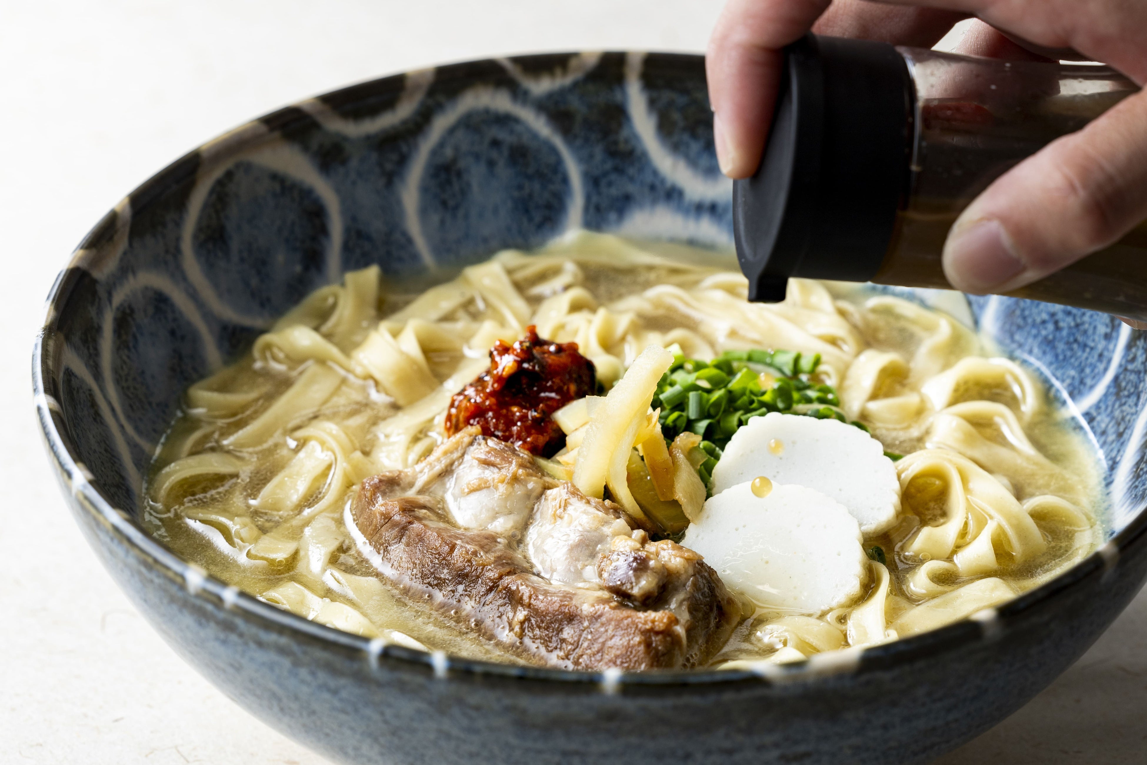 “進化系沖縄そば” くいなそばをご賞味ください。