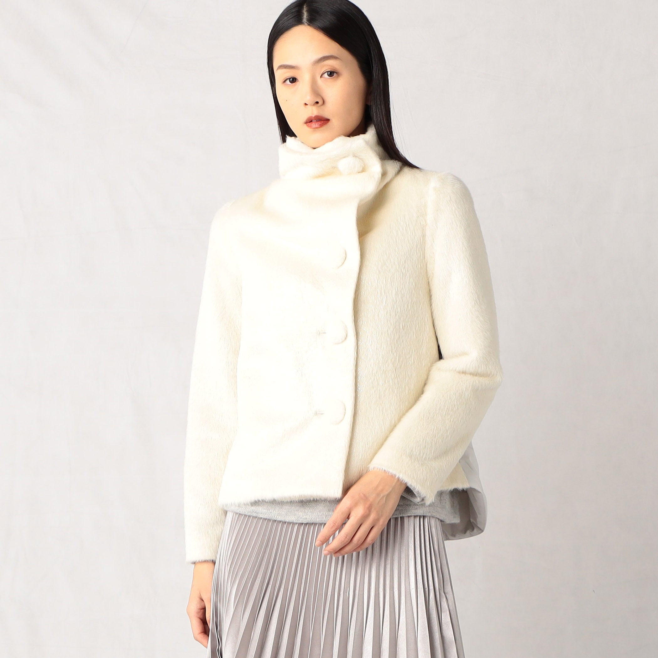 スタンドカラーにもなる襟