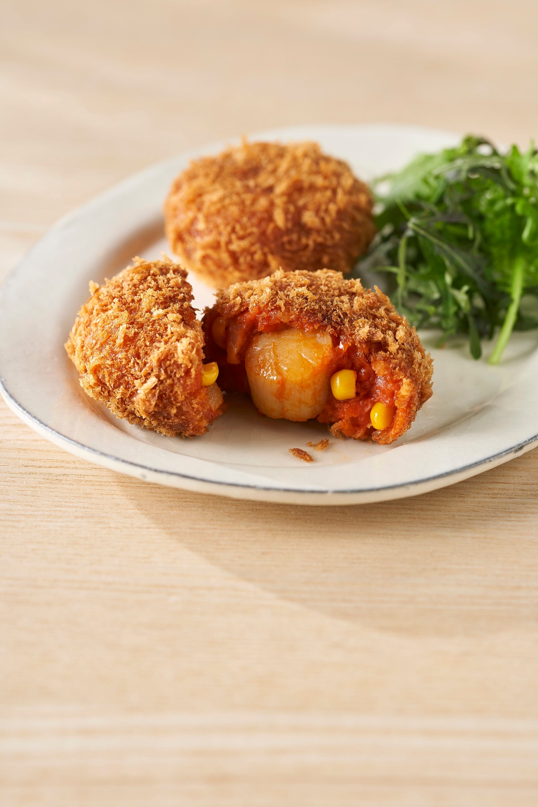 「じゃがいもＨＯＵＳＥ」 道産ホタテのトマトクリームコロッケ （1個）486円［各日限定200］ ※4月19日（火）までの販売