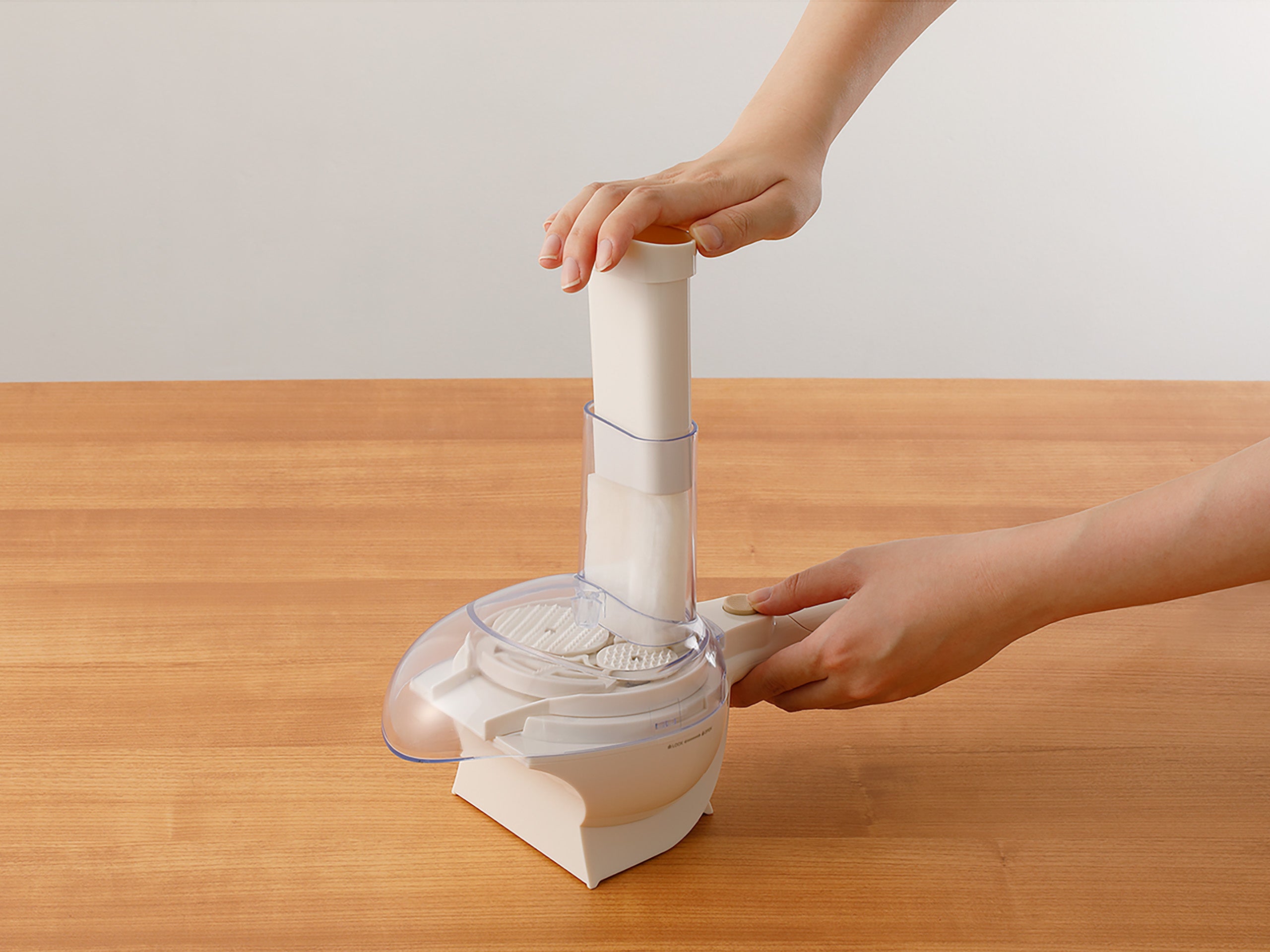 押し込み棒で押す