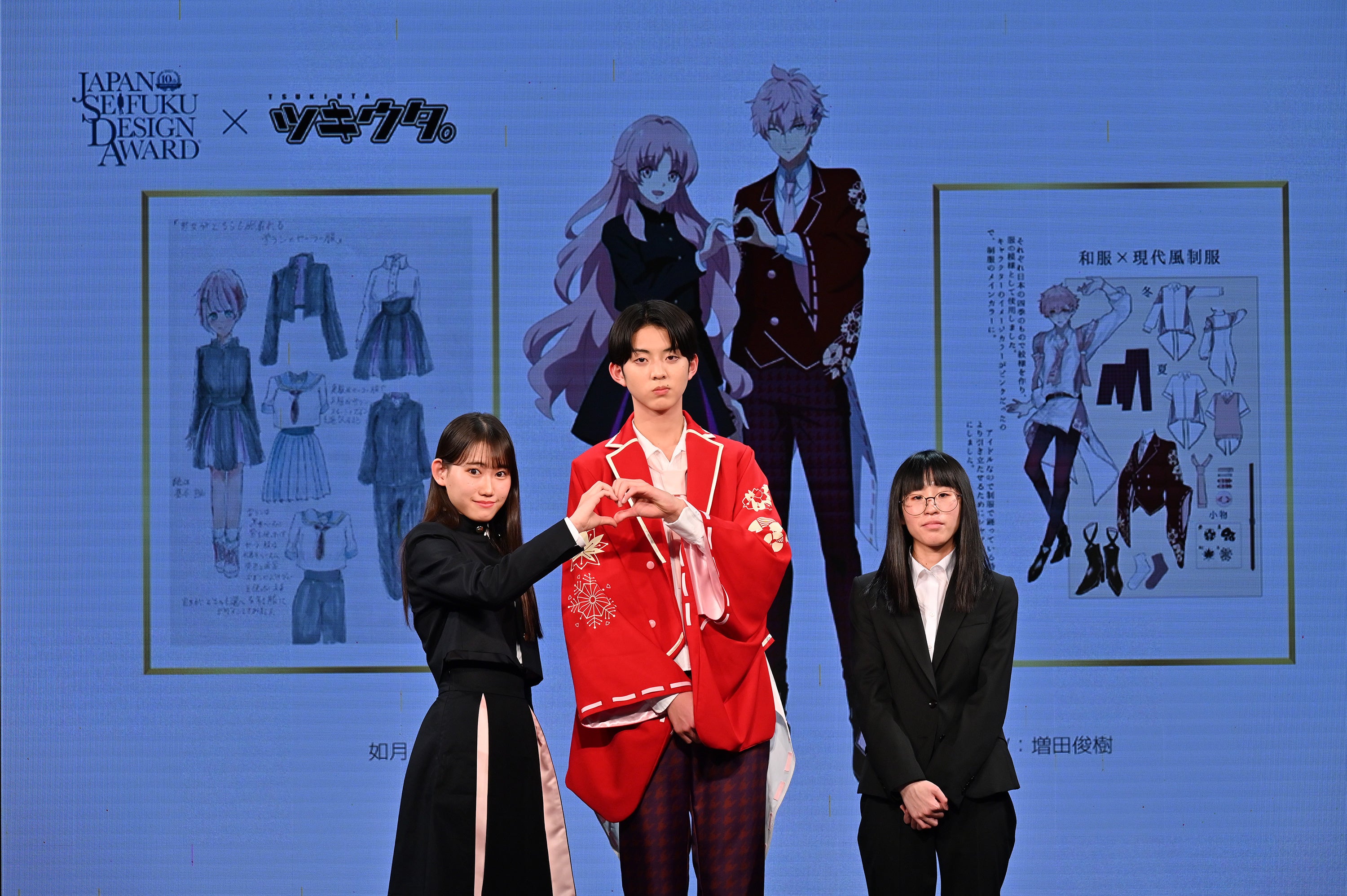 着用モデルと受賞デザイナー