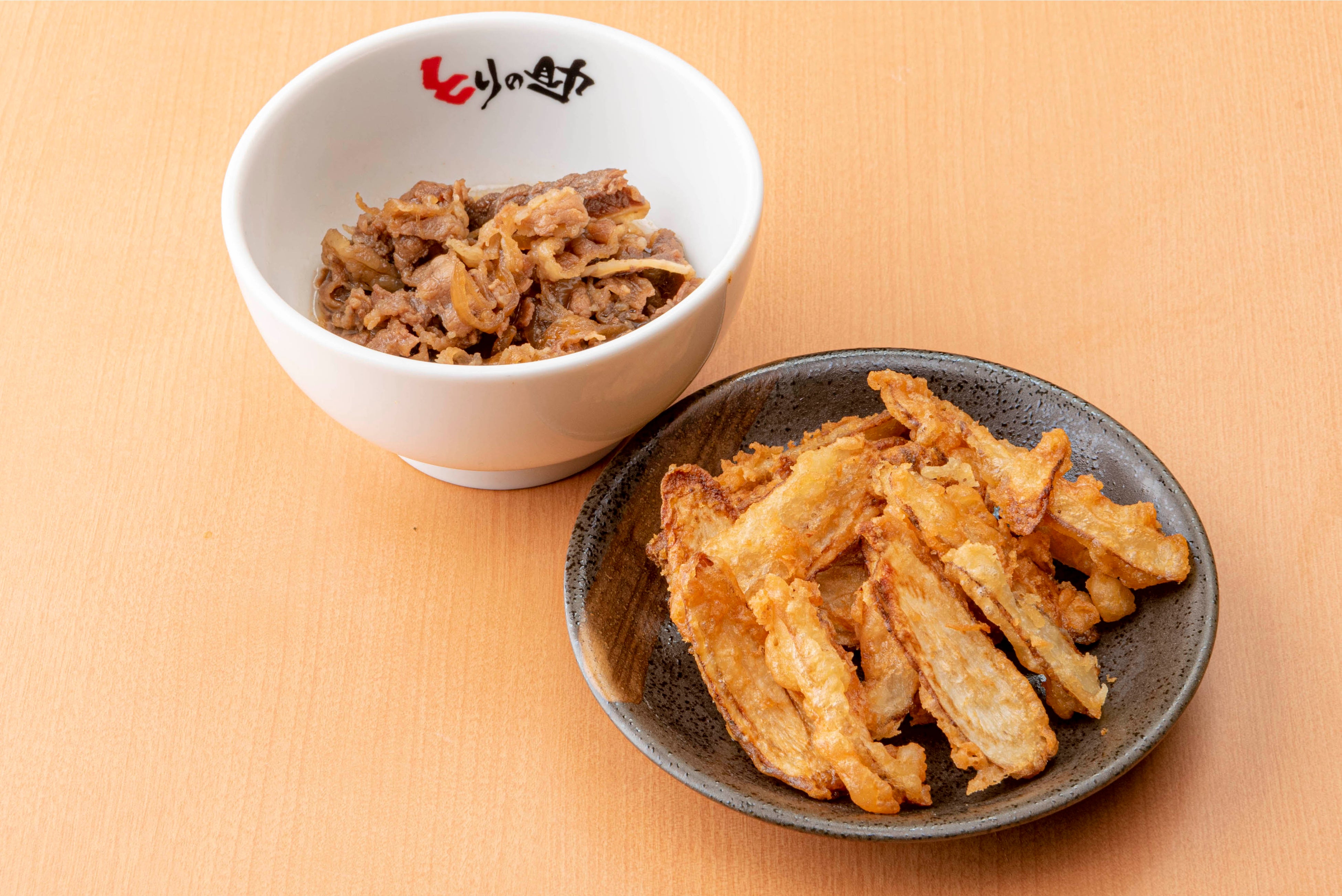 トッピング　ごぼう天　100円（税込110円）、肉　150円（税込165円）