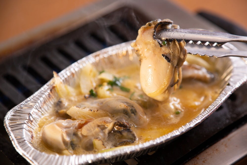 糸島産牡蠣のガリバタ焼き　880円（税込968円）