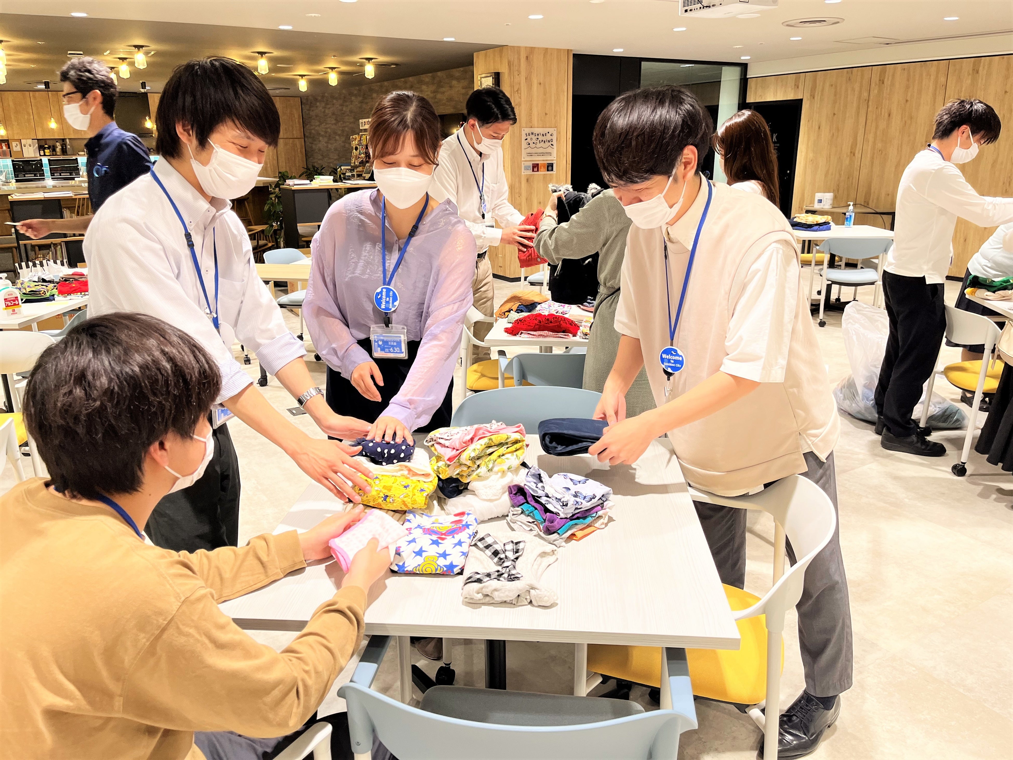 サンシャインシティグループ社員で畳む様子