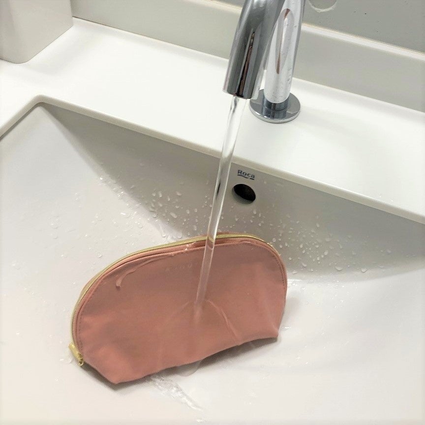 AJOUTER ウォッシュドフェイクレザーラウンドポーチ