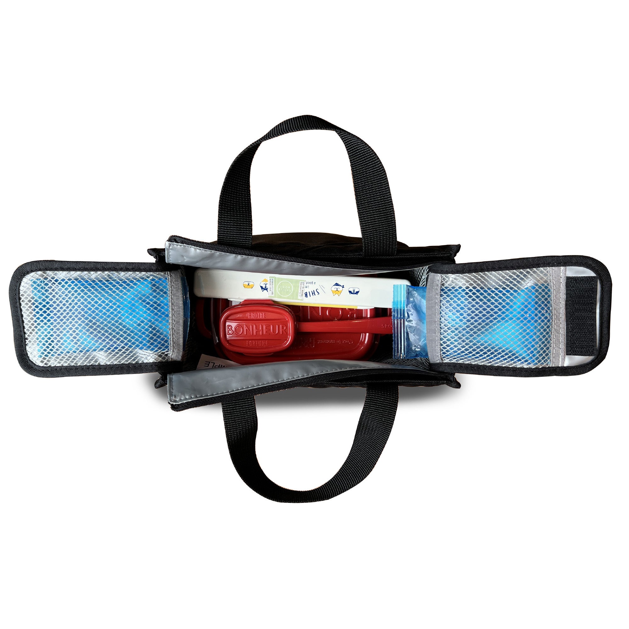 保冷剤ポケットが付いた二重の中フタ。上から下へ冷気が流れます。