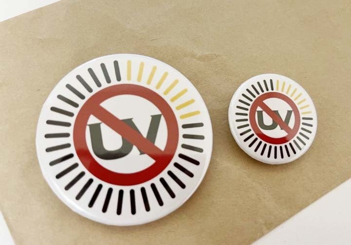 NO!UVマーク　バッチ