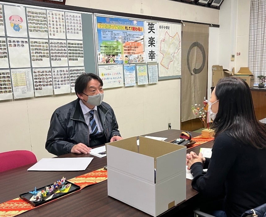 佐野校長と松成の打ち合わせ風景