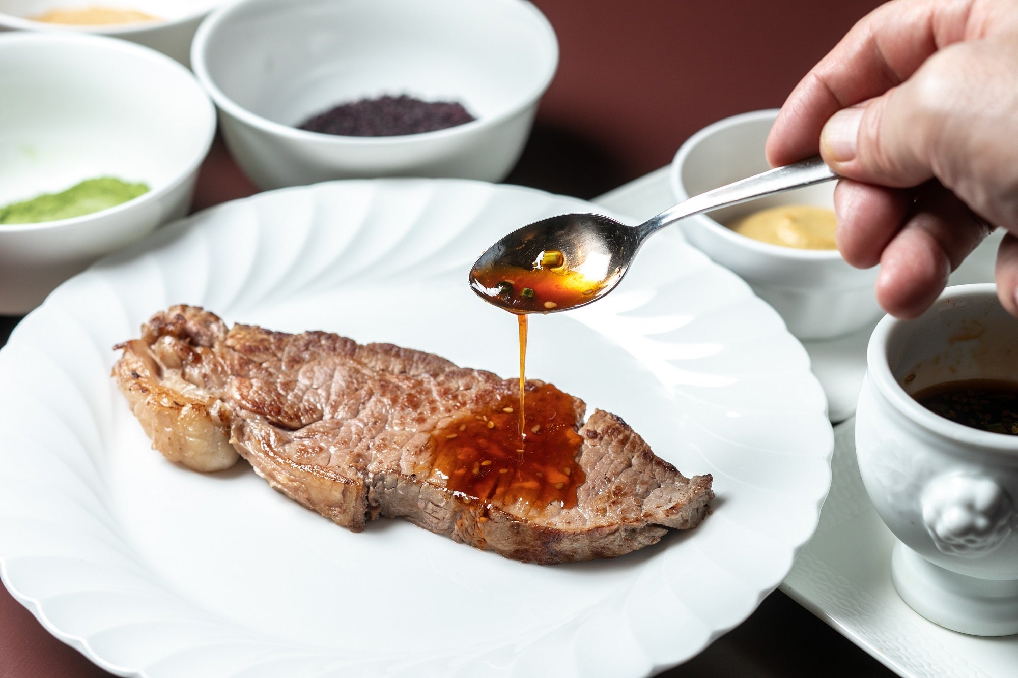 パフォーマンスコーナーでの鉄板焼きステーキ(イメージ)