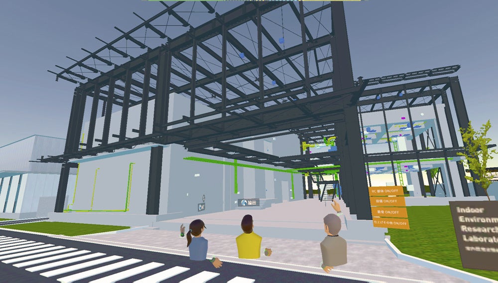 室内環境実験棟の設備や構造について確認している様子