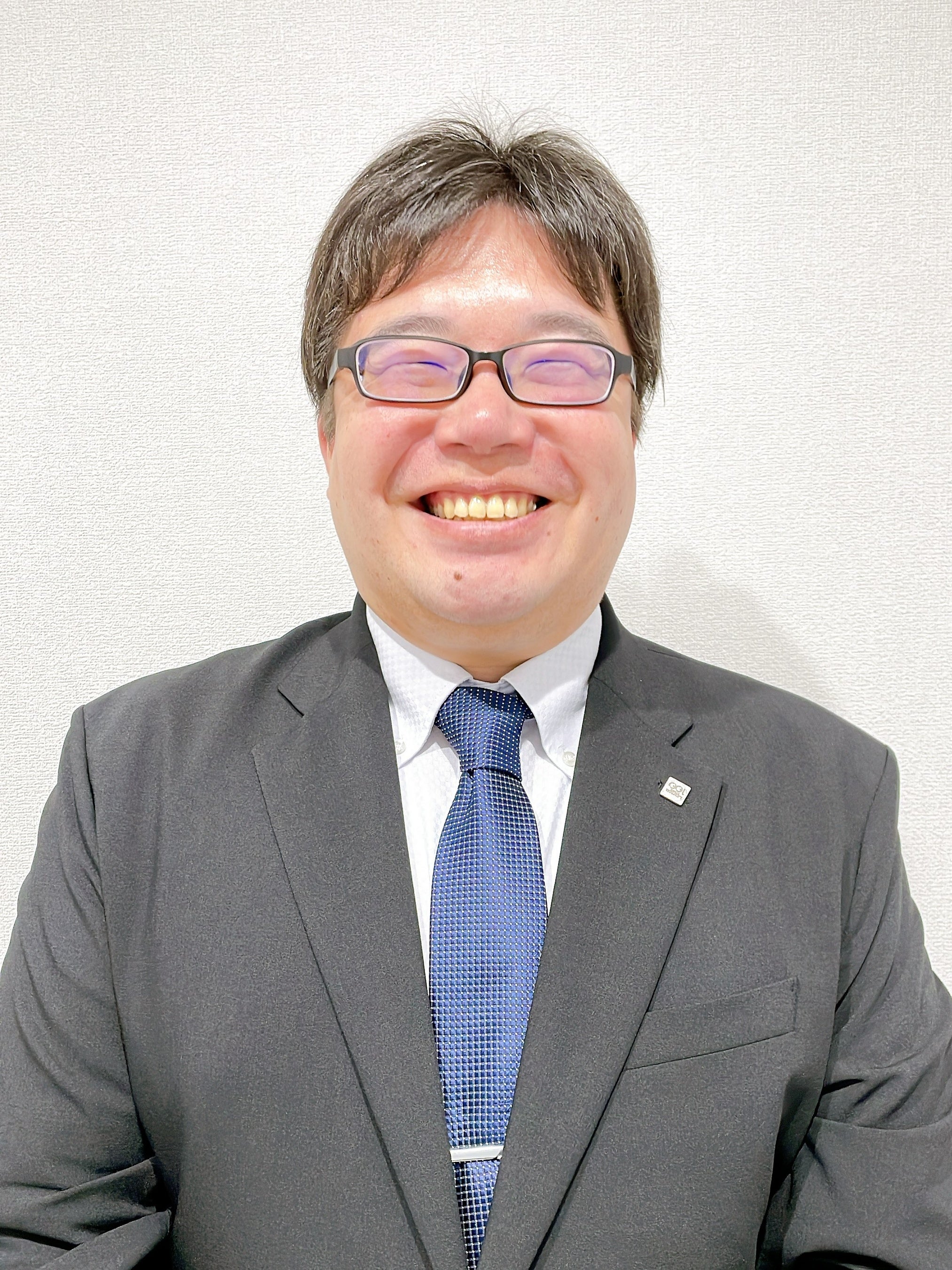 商品開発本部　小林宣夫