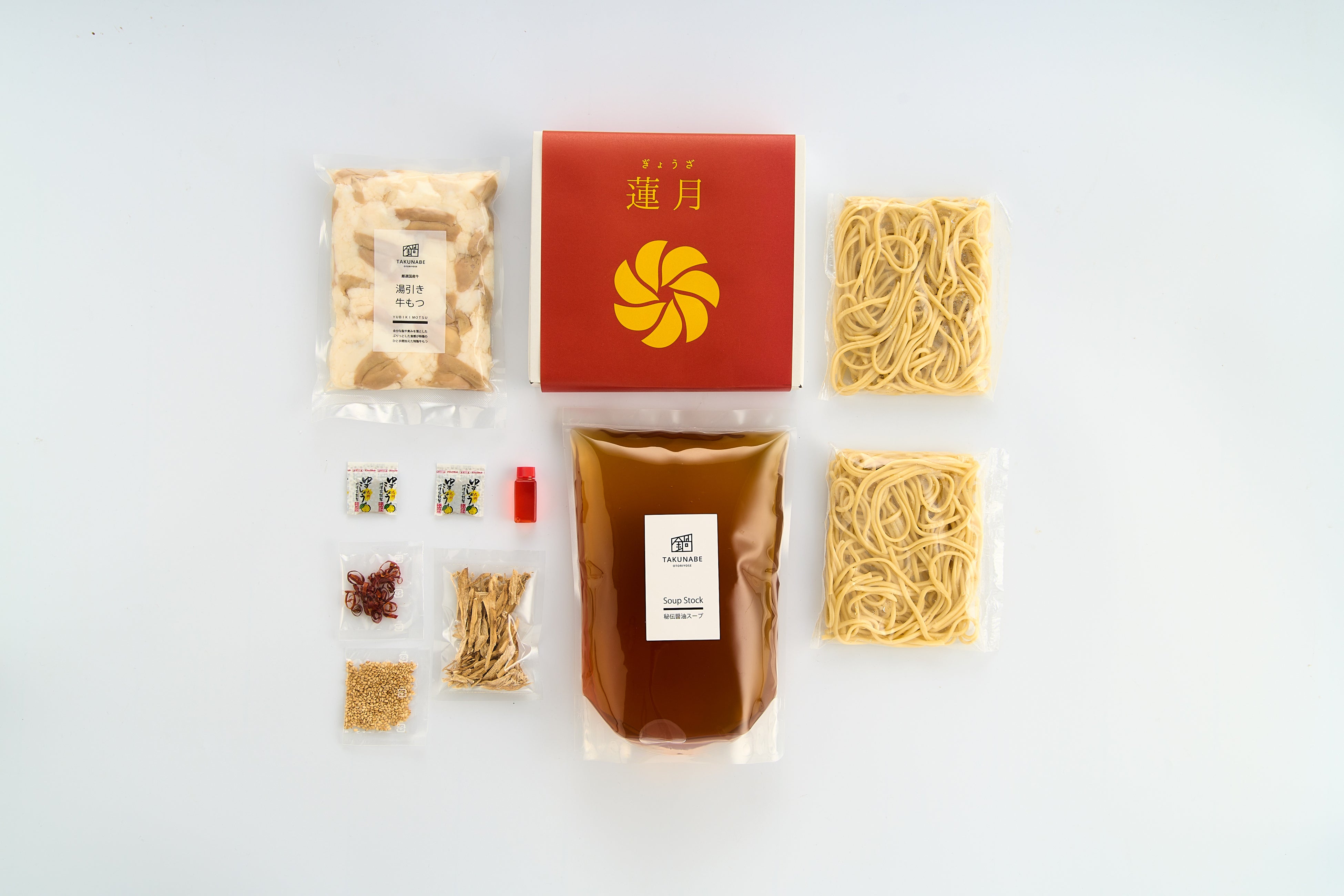 蓮月「餃子10個入」とTAKUNABE「もつ鍋２～３人前」のセット写真