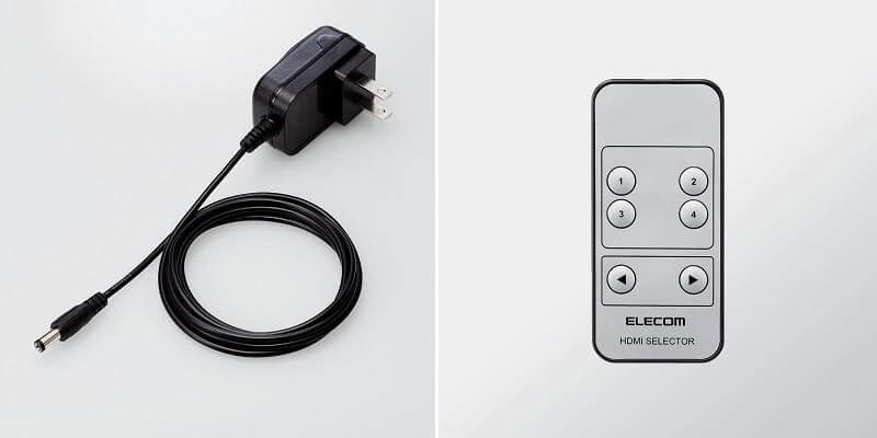 ▲ 標準で専用ACアダプターと専用リモコンが付属 (写真の専用リモコンは4ポートモデル)