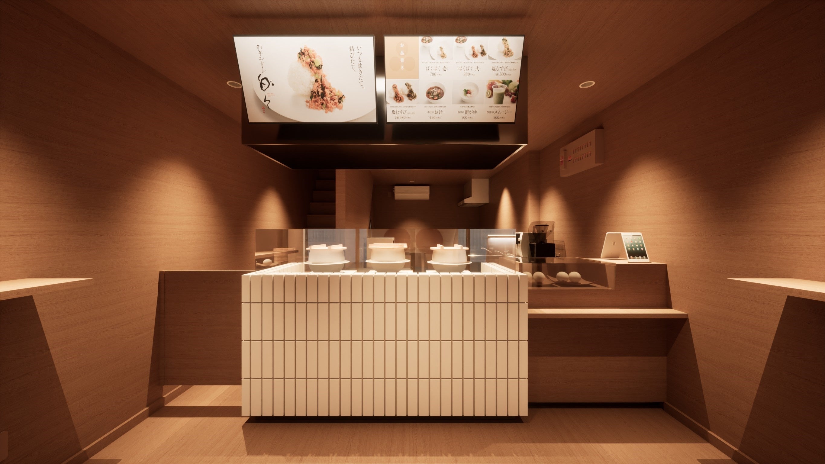 炊きたてのご飯を見ることができるカウンターの羽釜が目を引く