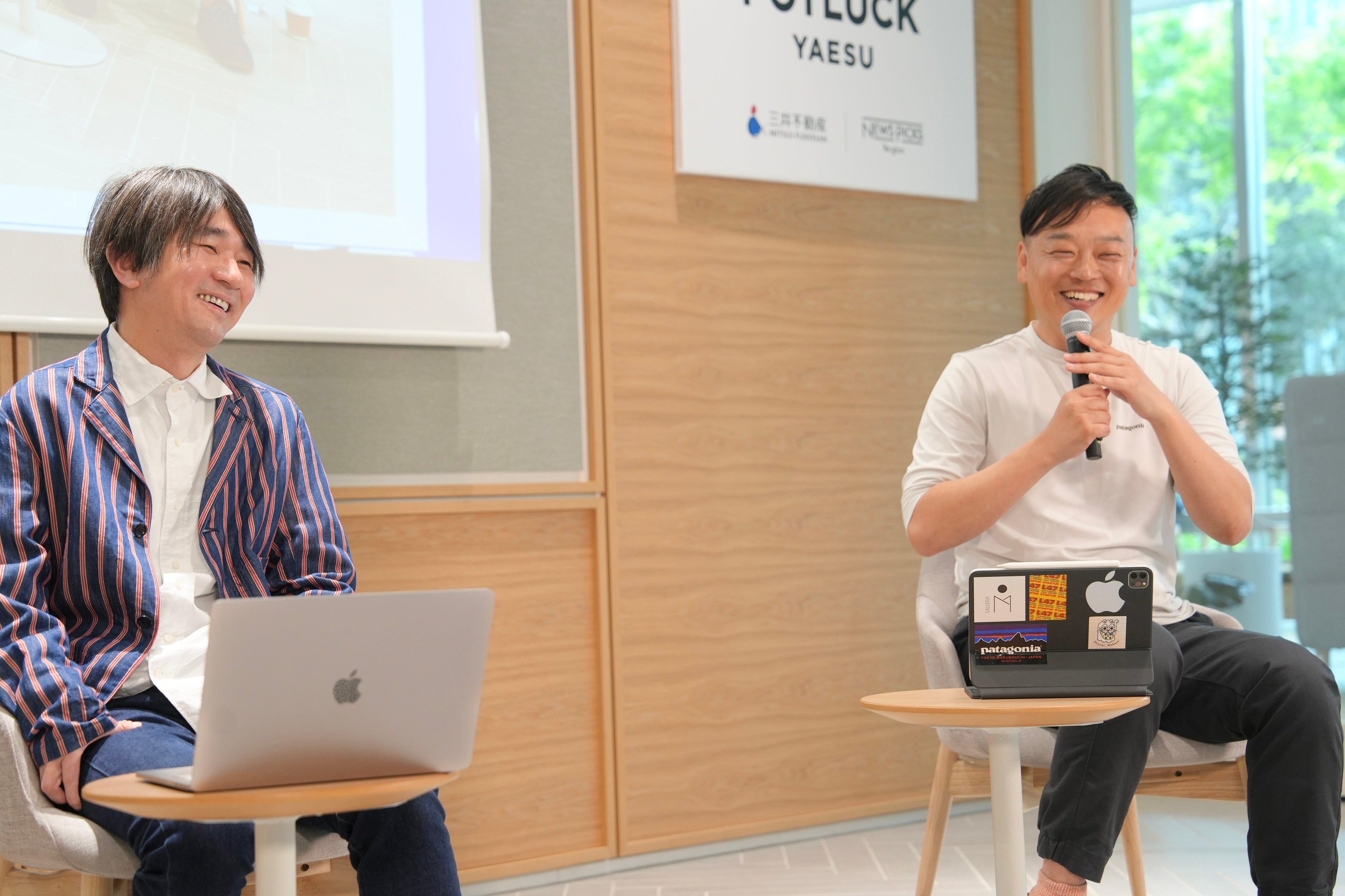 指出氏（写真左）から多様な地域との関わり方の事例を伺う様子