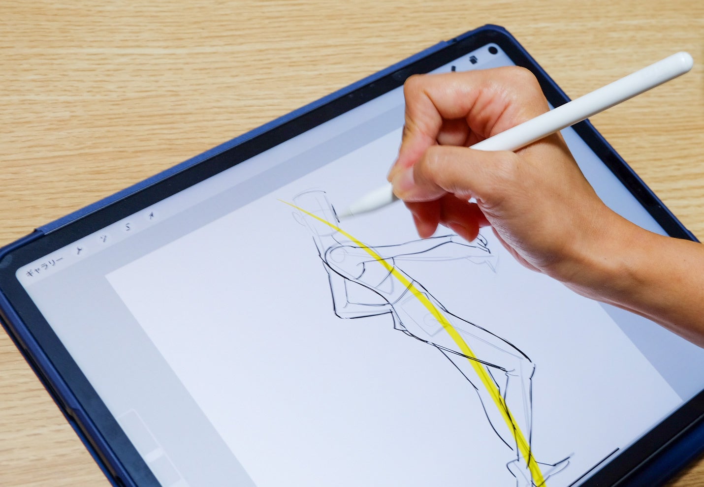 ▲印象を1本の線で描いたあと、2分で人物を描いていく様子