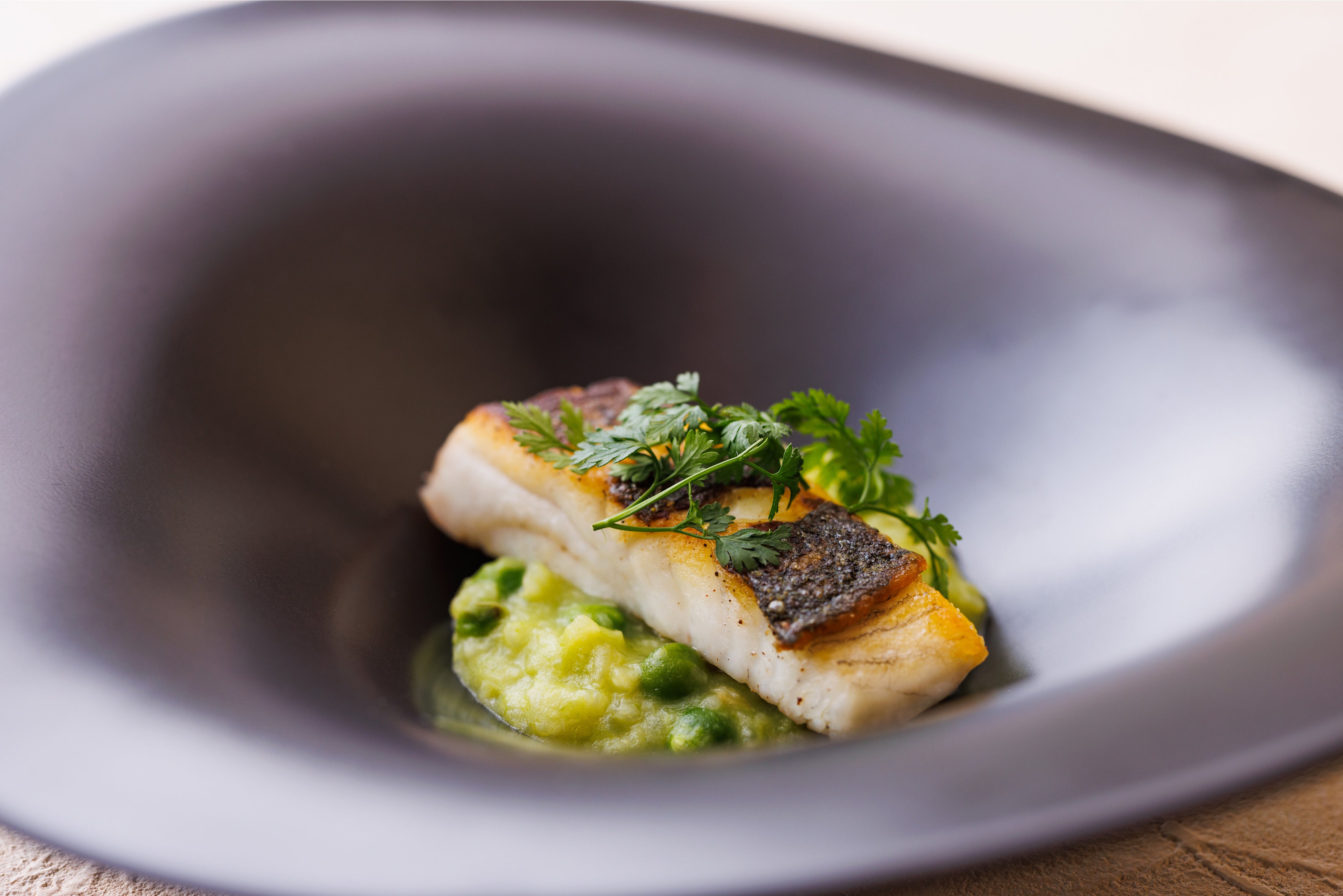 本日のお魚のポワレ 会津産グリーンピースのリゾット“リージエビージ”