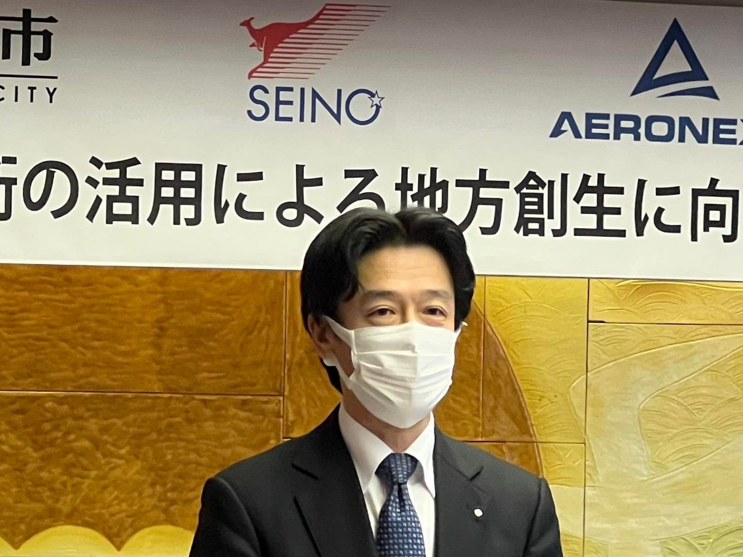 挨拶するセイノーHD執行役員 河合秀治