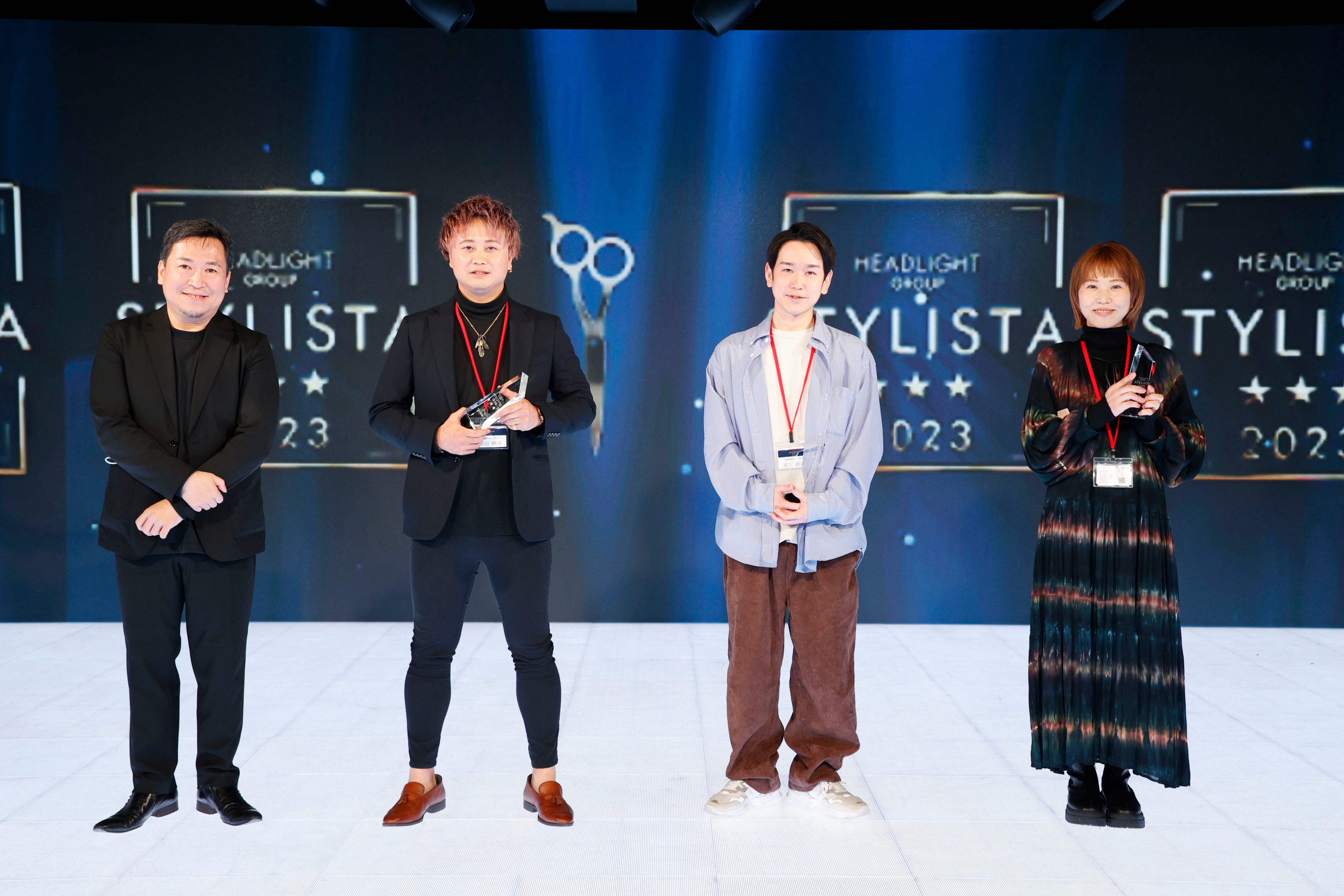 3つ星を獲得した3名　左は当社社長・高橋　※撮影時のみ一瞬マスクを外しています。