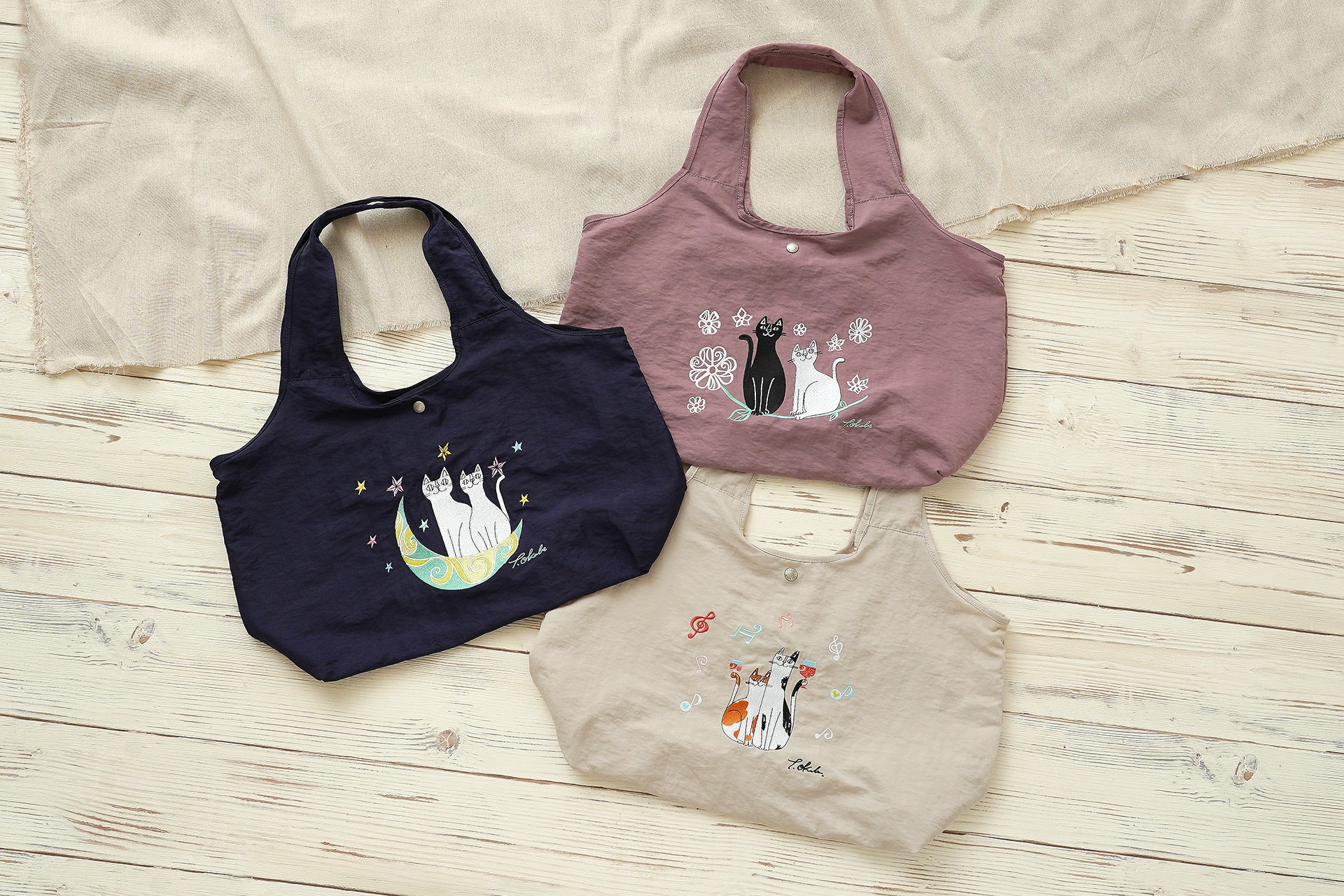 【OKABE TETSURO(おかべてつろう)】WEB限定で先行予約スタート！愛らしい猫を繊細なアート刺繍で表現。軽量＆大容量で折りたたみもできるバッグ。秋のお出かけや旅行、サブバッグにもおすすめ