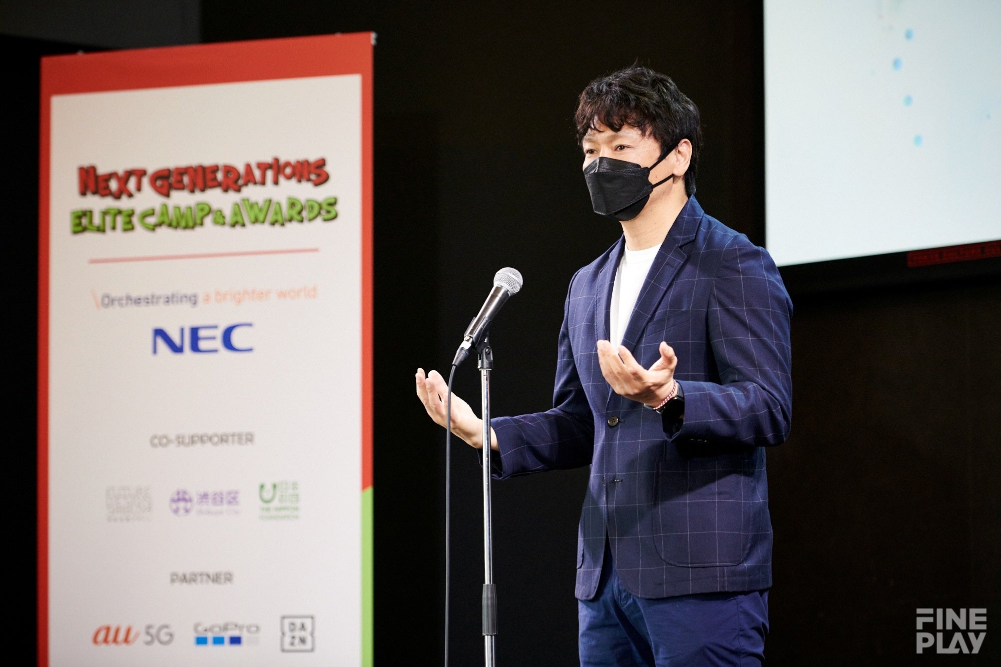  タイトルパートナーのNEC 岡村 要 様より参加者へ激励　