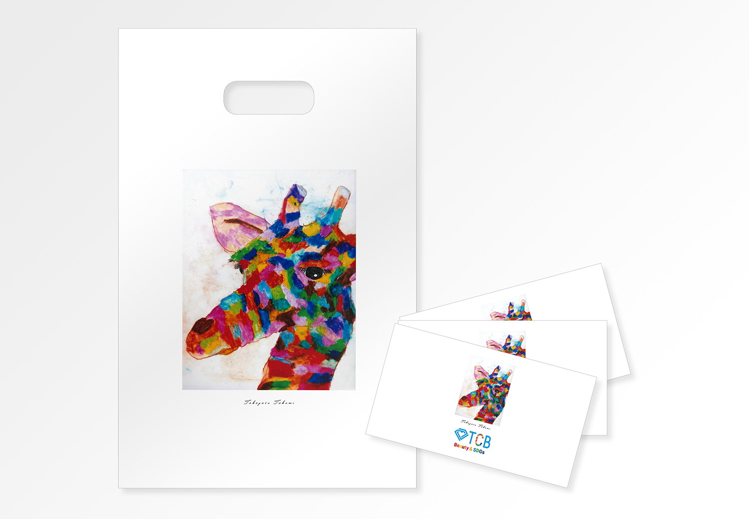 「チャーミングなキリン」を用いたエコ素材のオリジナルショッパーバッグと封筒