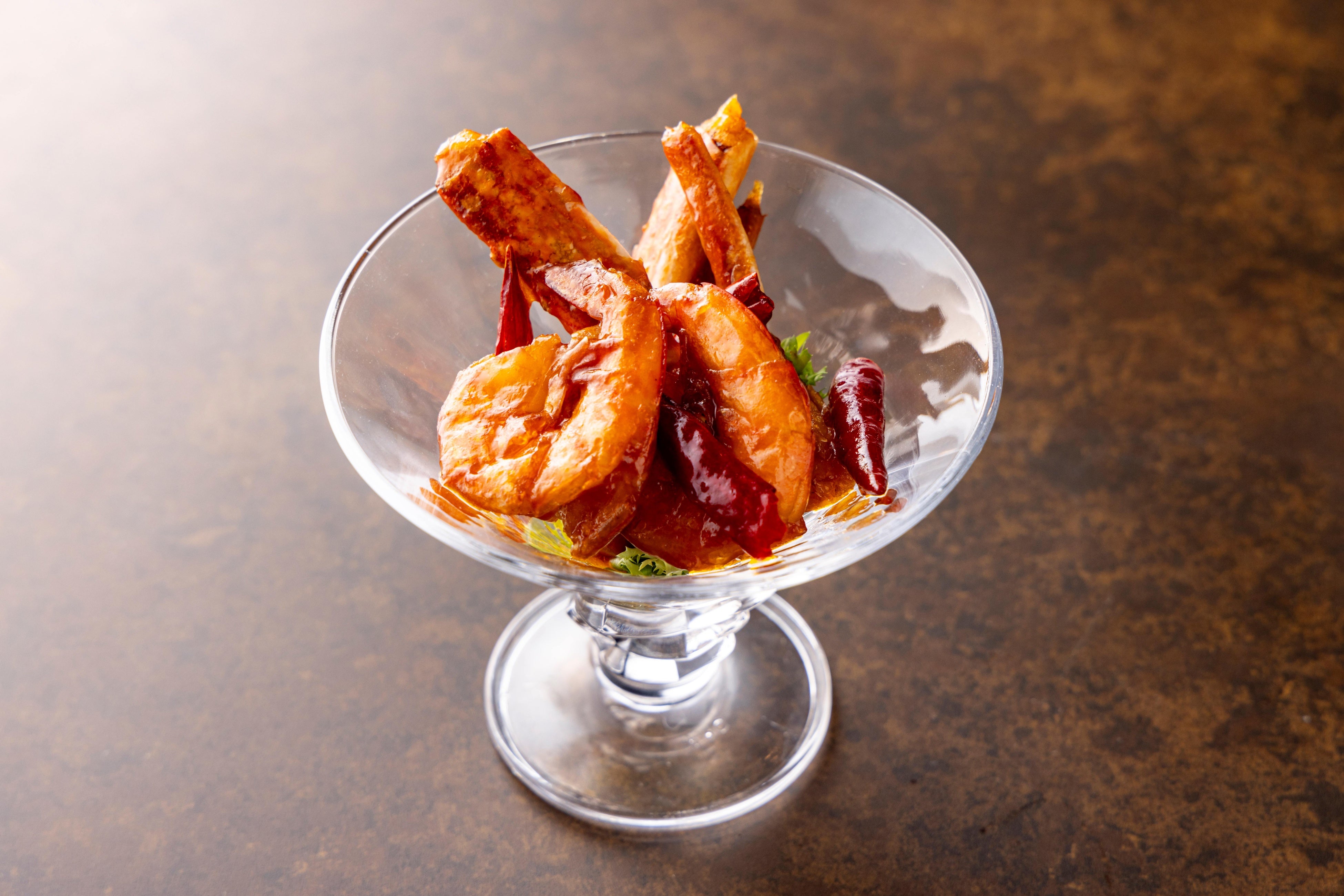 殻付き海老と渡り蟹の四川甘辛ソース炒め