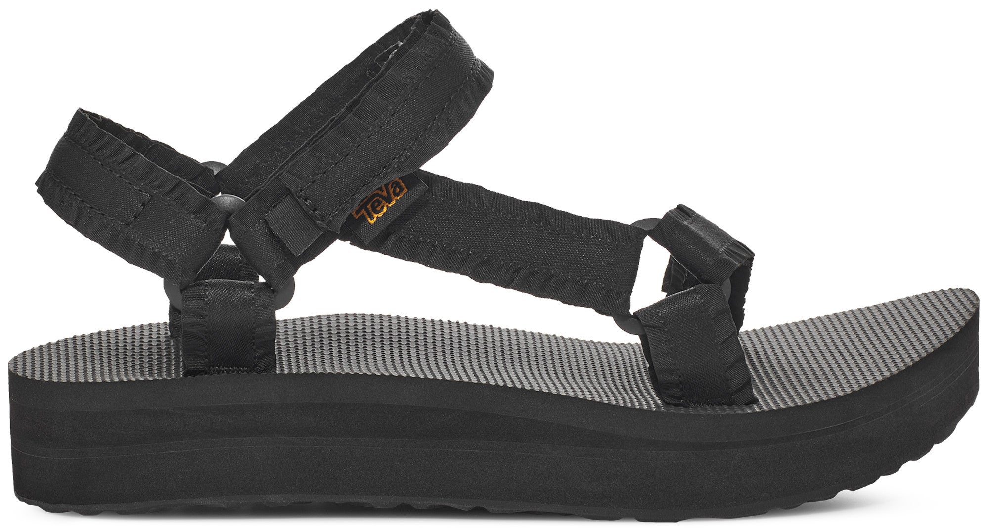 Teva Midform Universal スタッズ サンダル Teva から、フリルのストラップがかわいい約3cmソールのスポサン