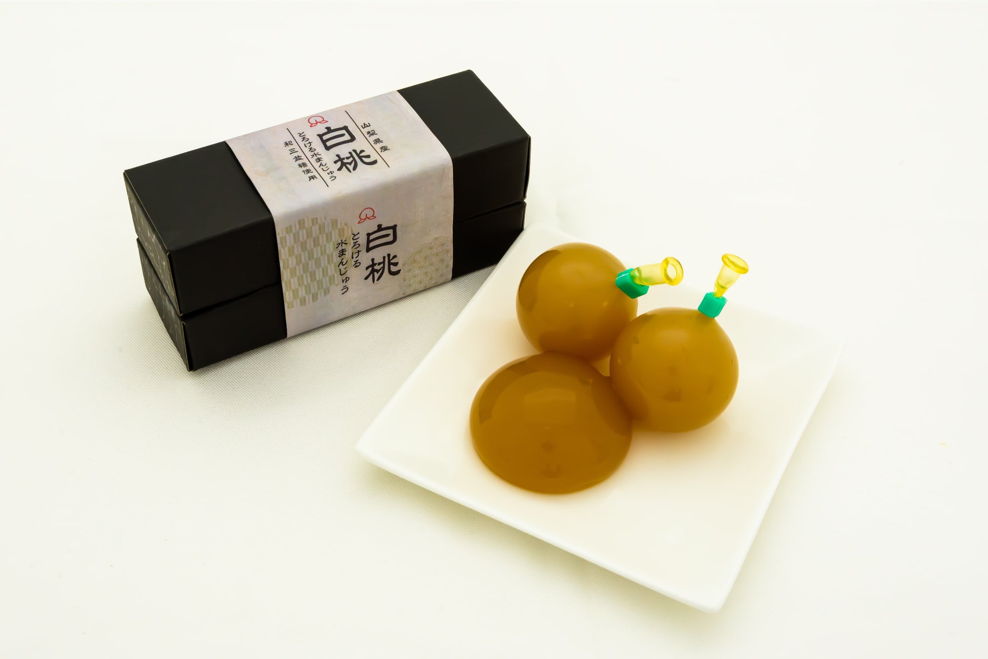 甲信食糧株式会社【とろける白桃水まんじゅう】