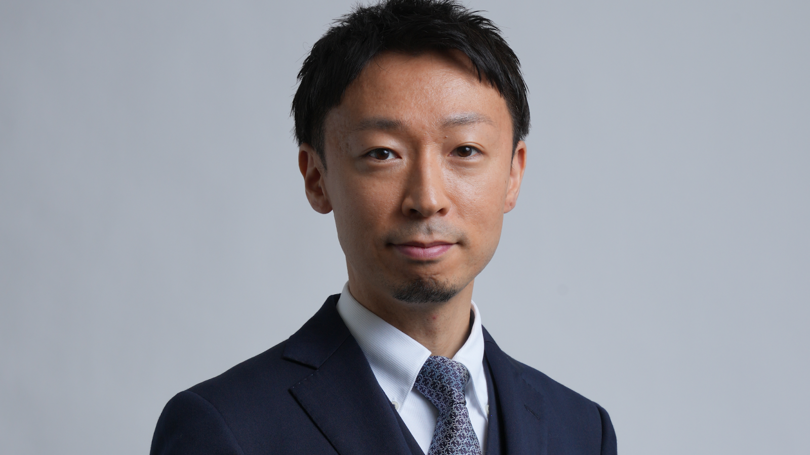 代表取締役社長：根本 敦史