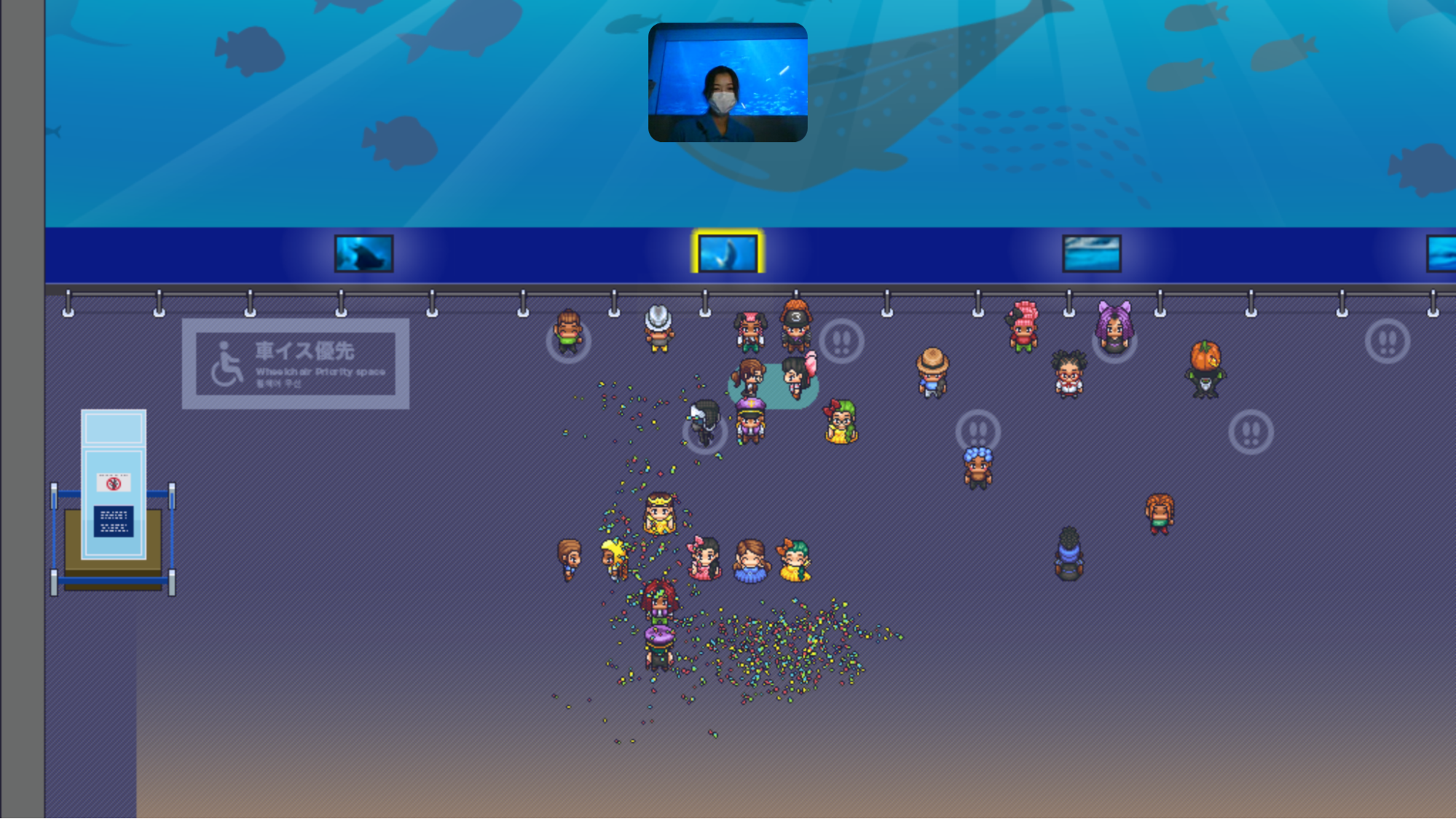 会場のバーチャル沖縄美ら海水族館「黒潮の海」大水槽前で記念撮影