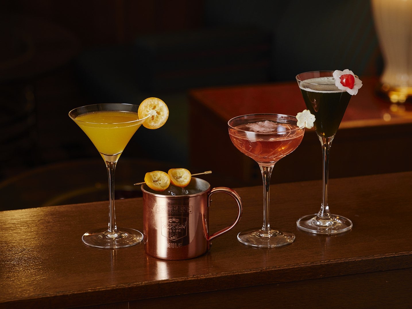 マンスリーシグネチャーカクテル 3月(左から、まるごと金柑カクテル、金柑のモスコミュール、桜ジンジャーロワイヤル、夜桜)