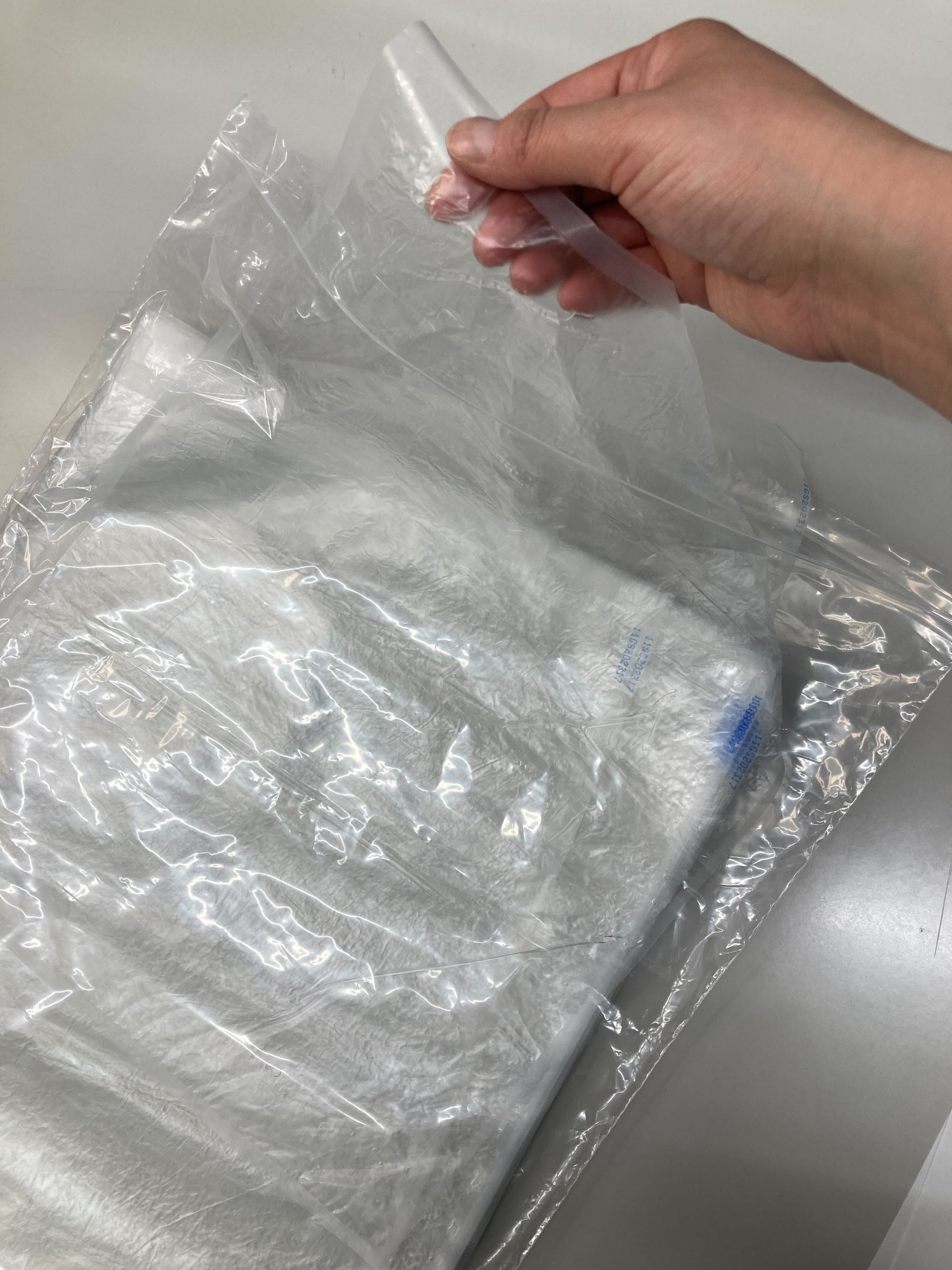 使い勝手を追求し、取り出し口を長側面から短側面へ